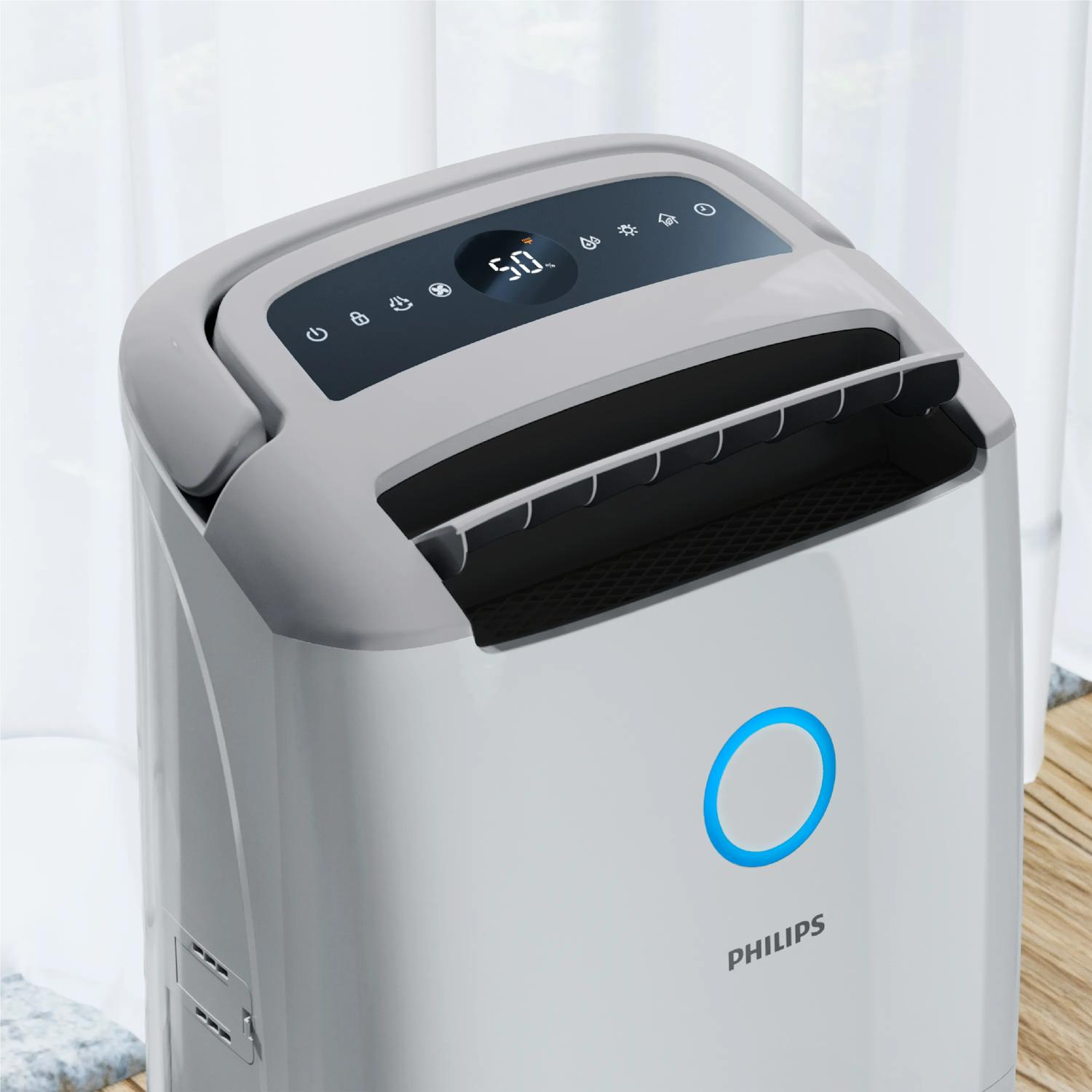 Ein weißer Philips Luftentfeuchter mit digitaler Anzeige und blauer Statusleuchte.