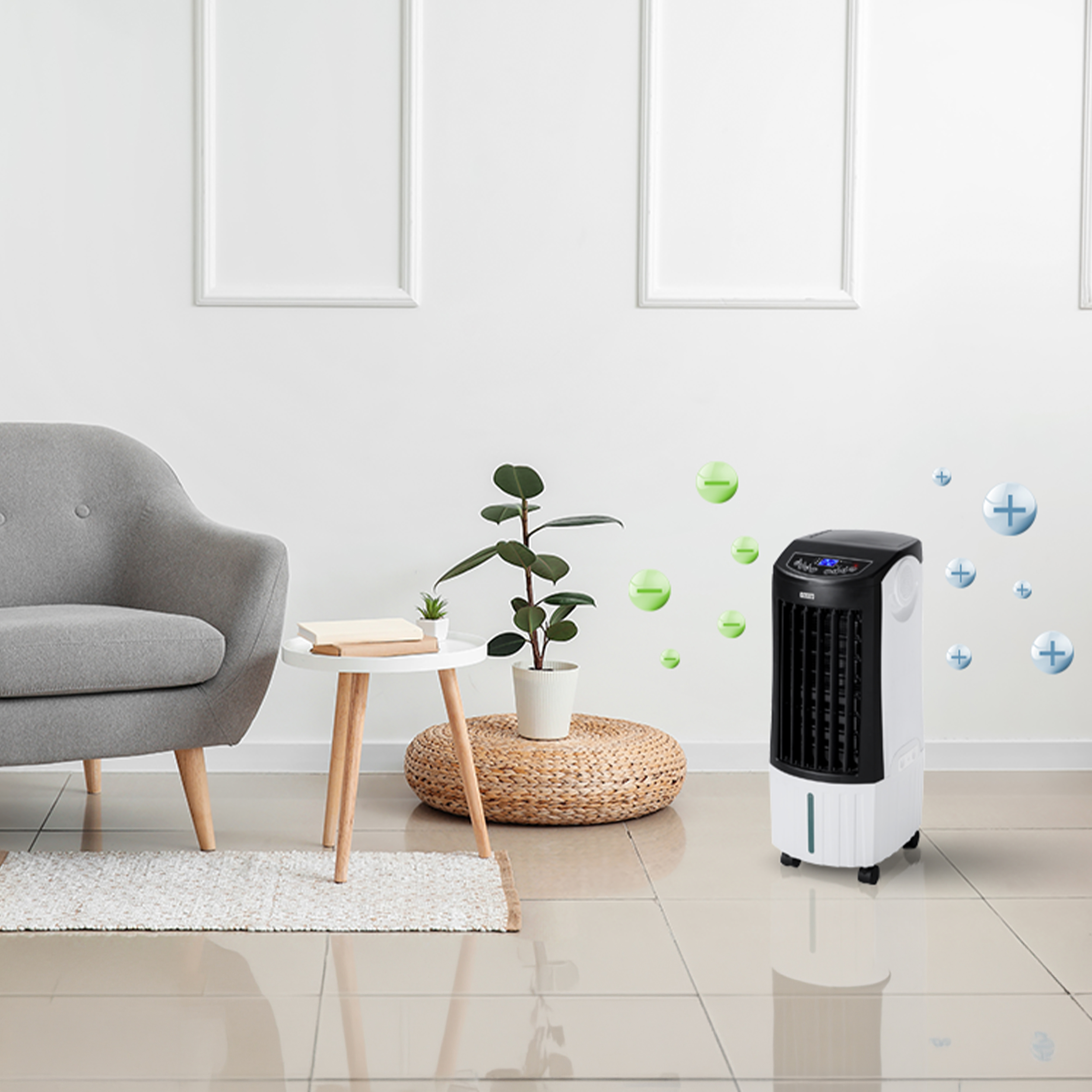 Biało-czarna chłodziarka powietrza z wyświetlaczem stoi obok rośliny w doniczce.