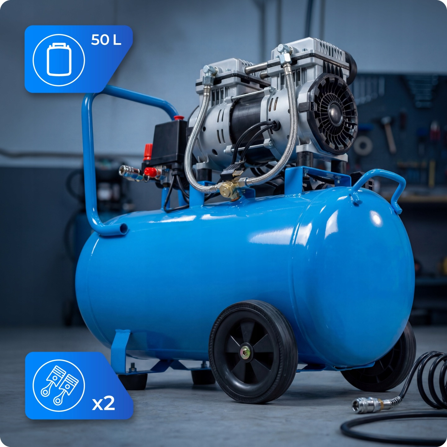 Niebieski kompresor powietrza 50L z dwoma tłokami stoi w warsztacie.