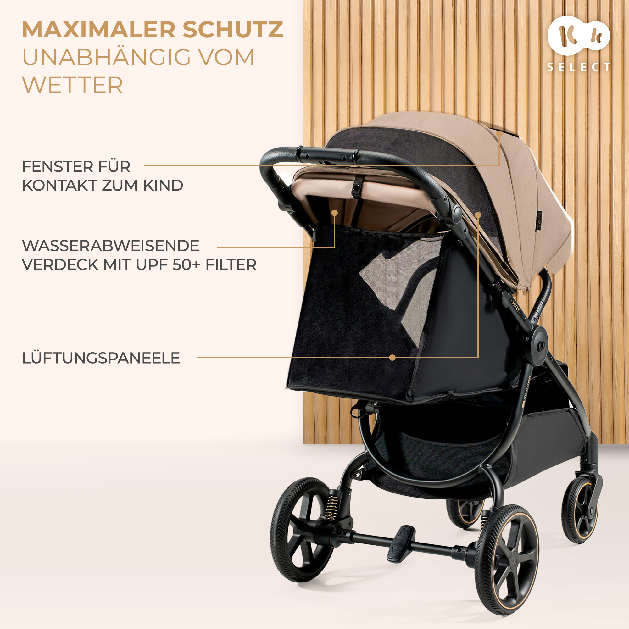 Ein beiger Kinderwagen mit schwarzem Gestell und Verdeck steht vor einer Holzvertäfelung.