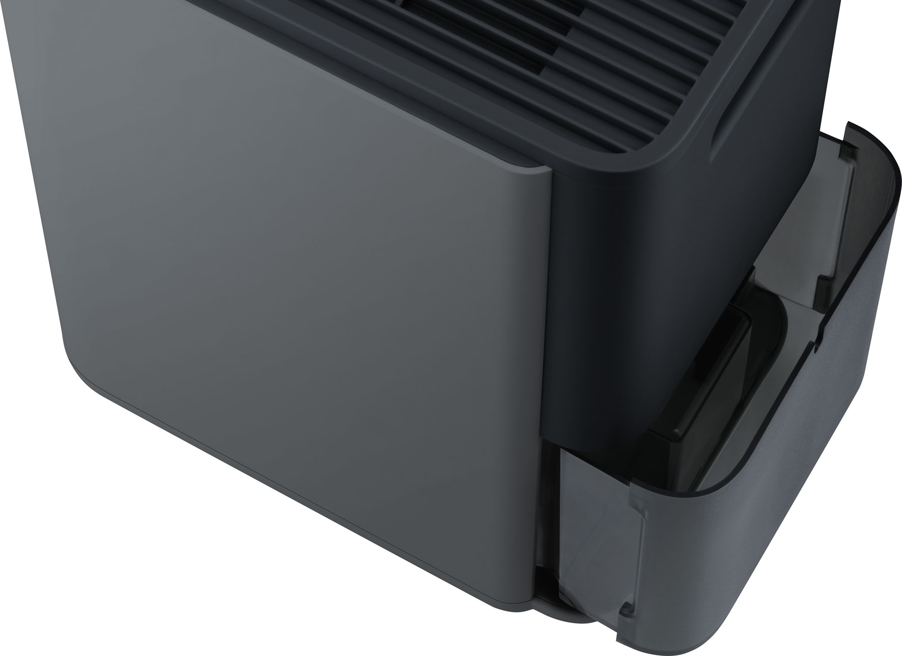 Un apparecchio grigio con un vano estraibile e fessure di ventilazione.