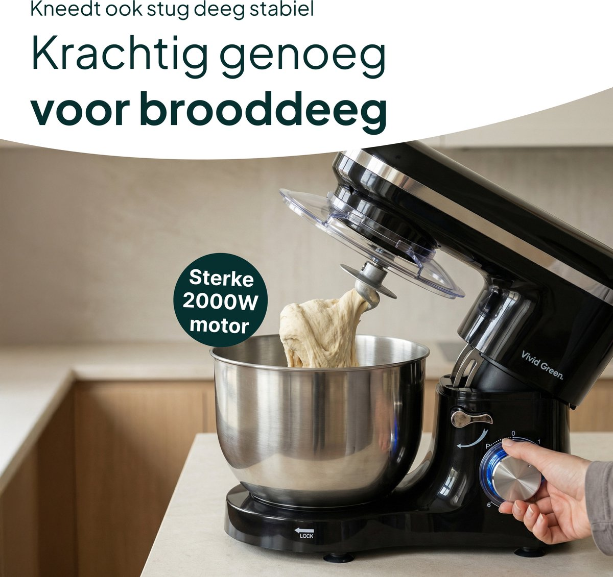 Black stand mixer kneading dough. Features a 2000W motor.