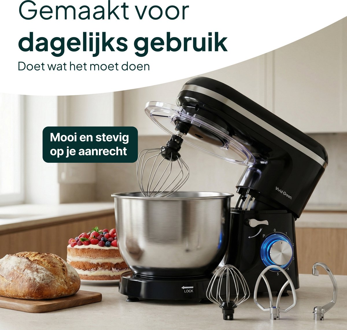 A black stand mixer with a stainless steel bowl, dough hook, and whisk attachments.