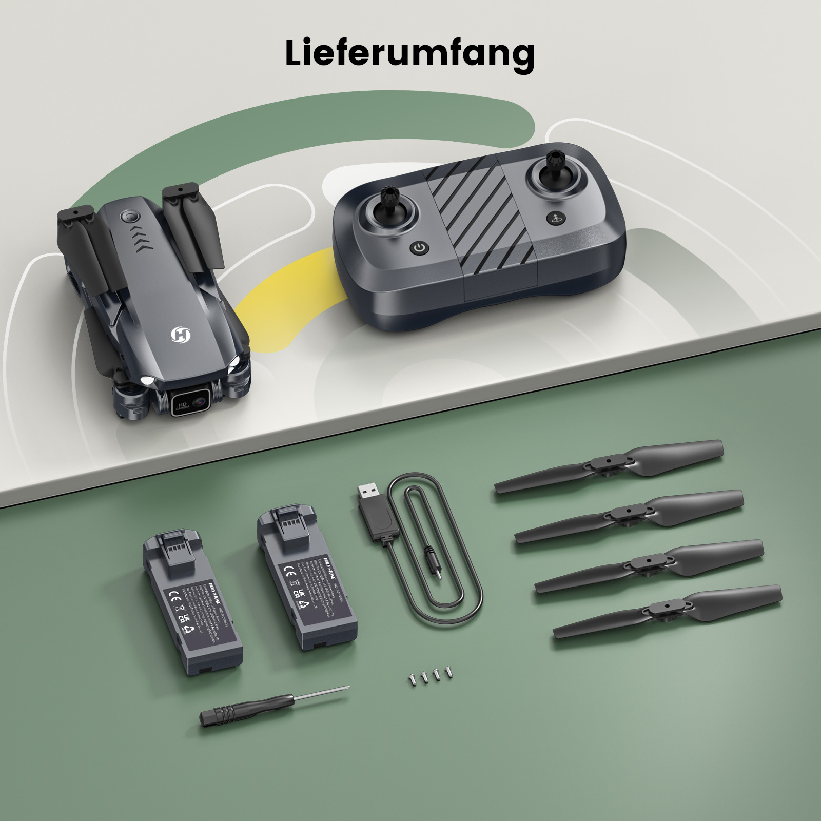Grauer Drohne mit Fernbedienung, Batterien, Propellern und Werkzeug.