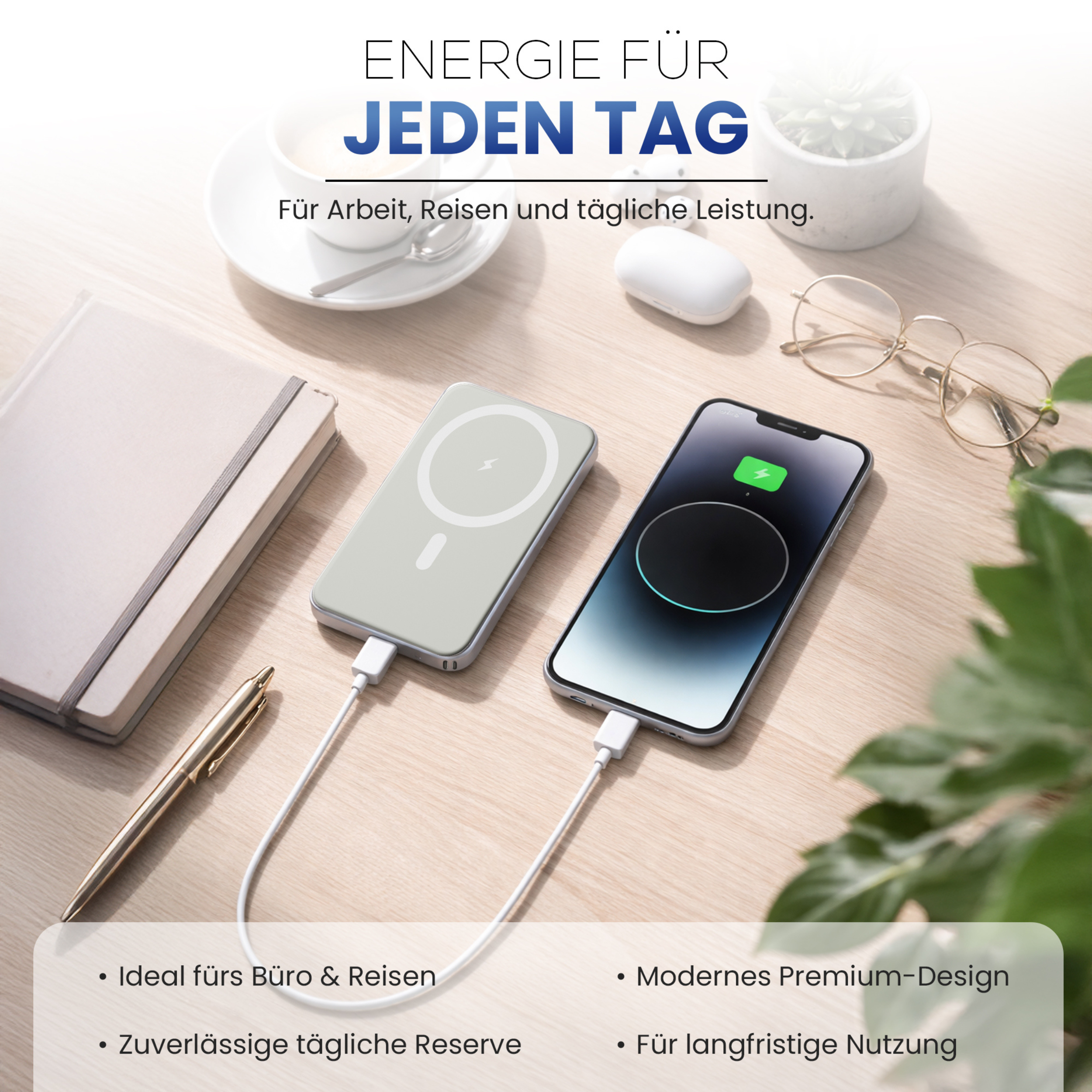 Ein Handy wird geladen, daneben ein Ladeakku und ein Notizbuch.