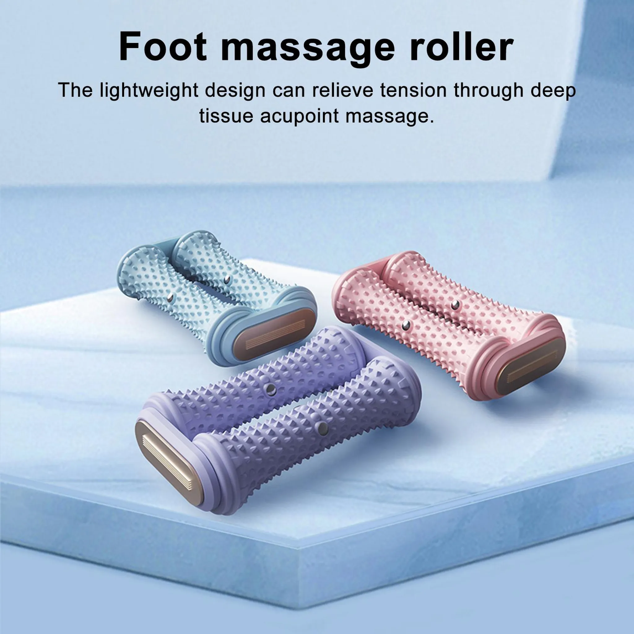 Drei Fußmassagegeräte in Blau, Lila und Rosa mit Noppen.