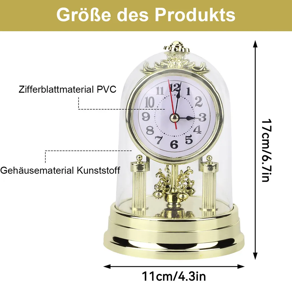 Goldene Uhr mit Glasglocke, 11cm breit und 17cm hoch.