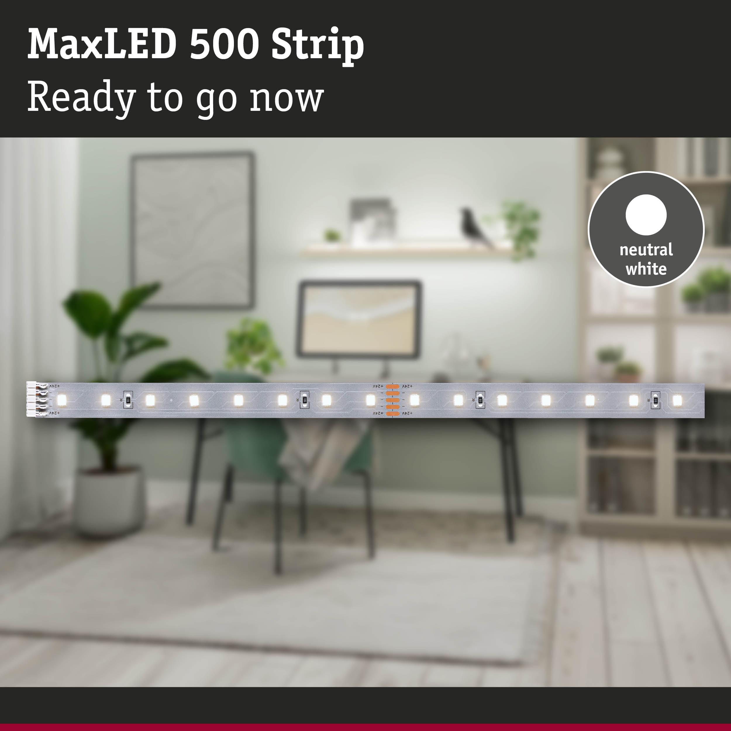 Eine helle LED-Streifenleiste mit neutralweißem Licht auf einem Schreibtisch.