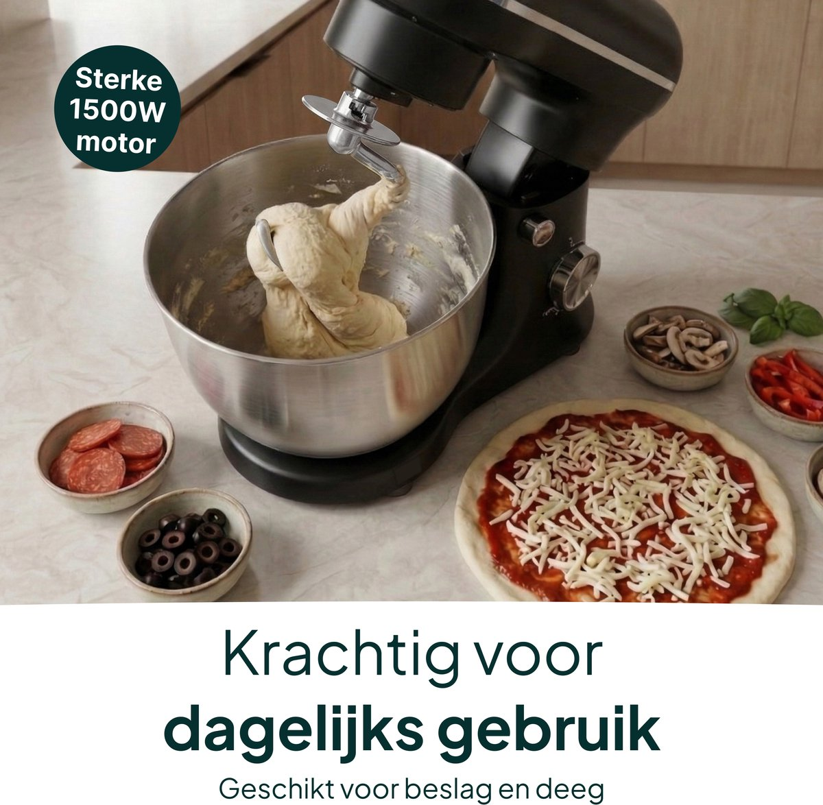Black stand mixer with dough in bowl, pizza and ingredients nearby.