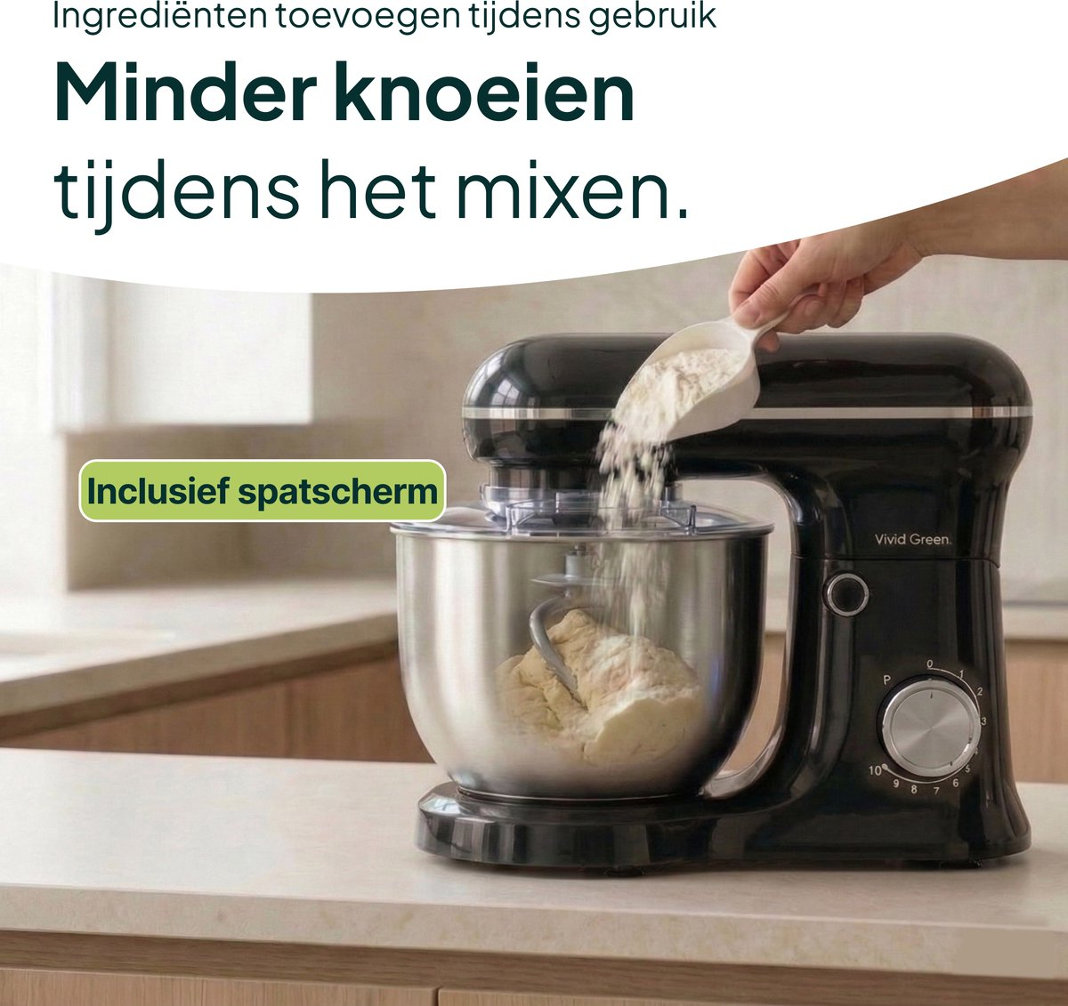 Black and green kitchen mixer adding flour into a bowl.