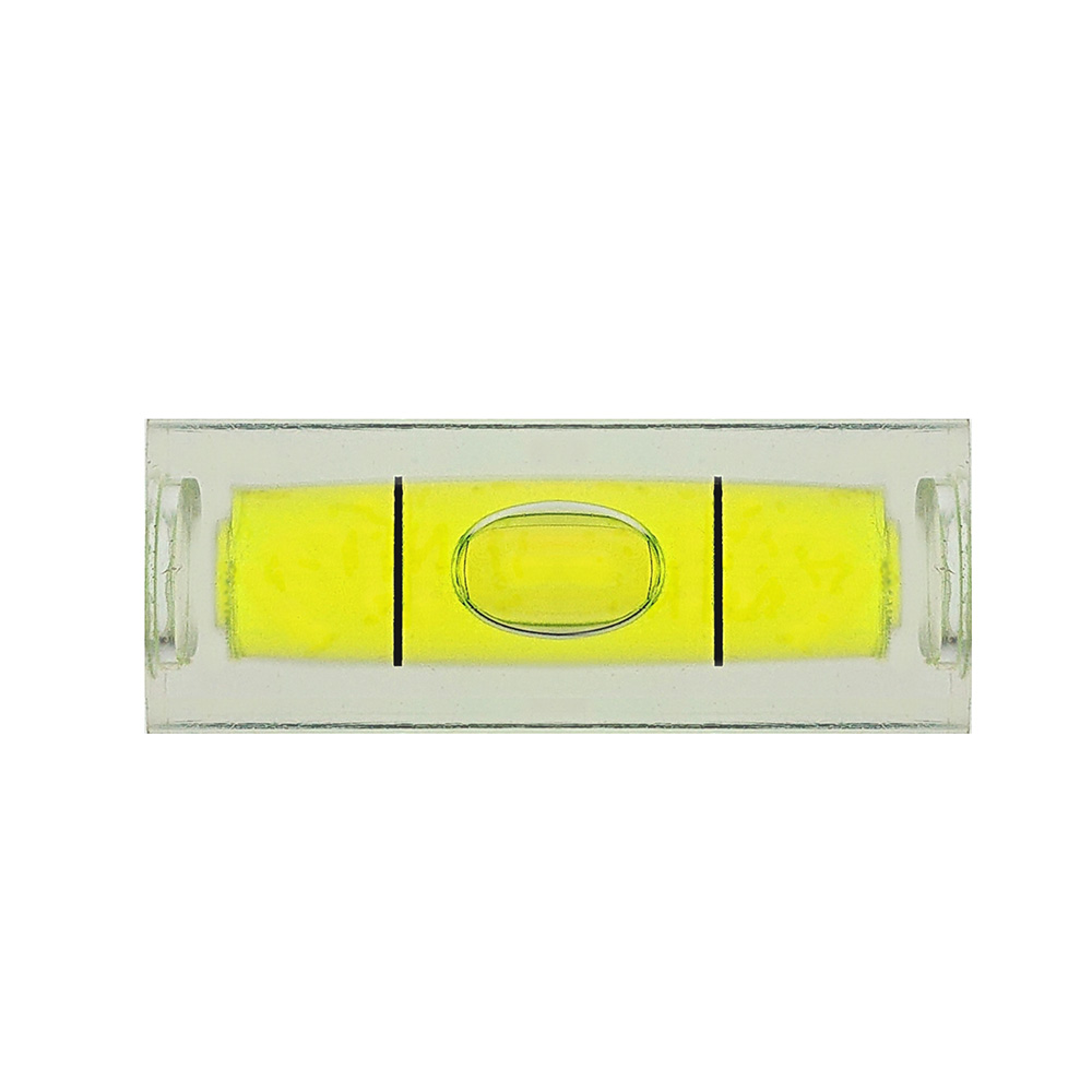 Przezroczysta fiolka libelli z żółtym płynem i pęcherzykiem.