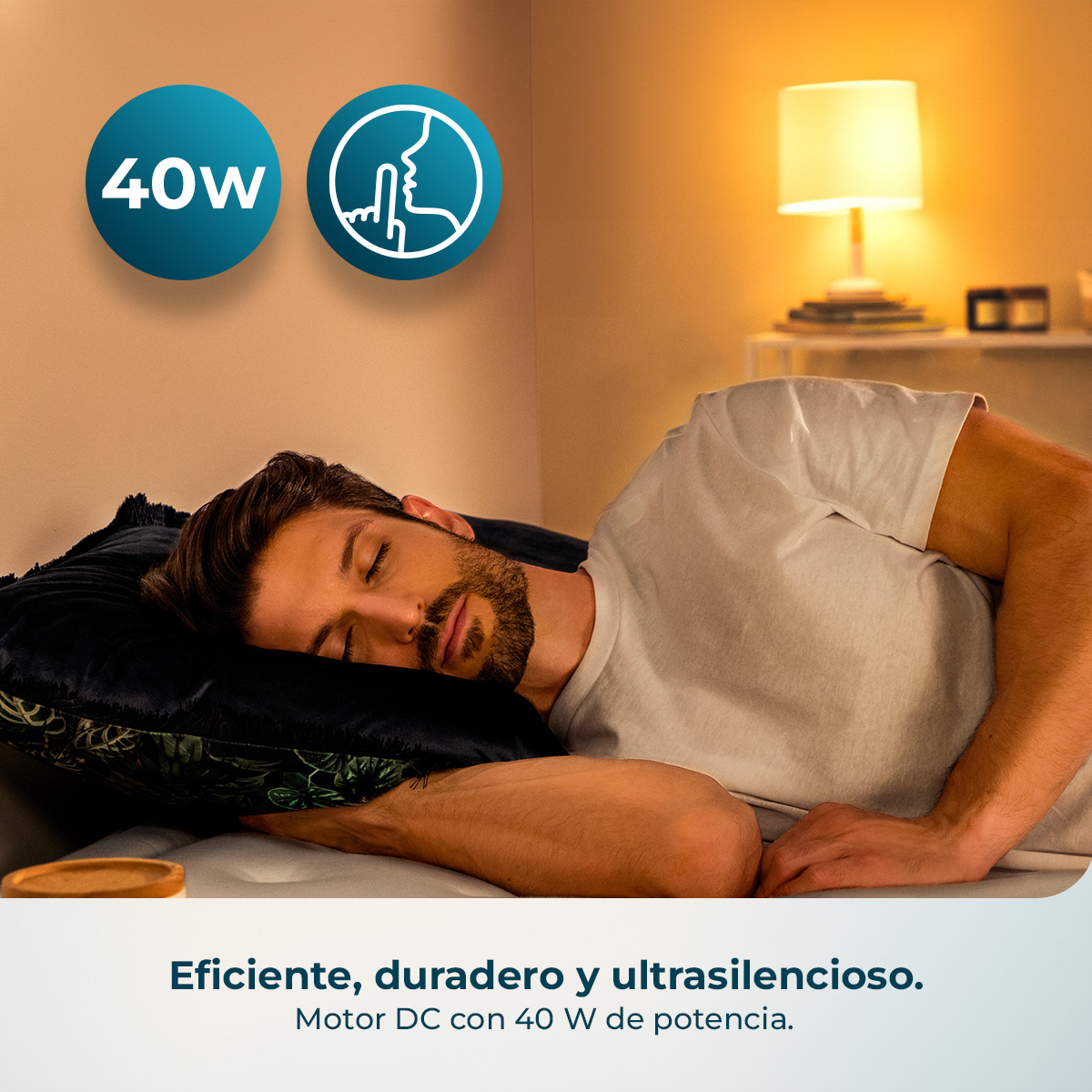 Hombre durmiendo junto a mesita de noche con lámpara. 40W y silencioso.