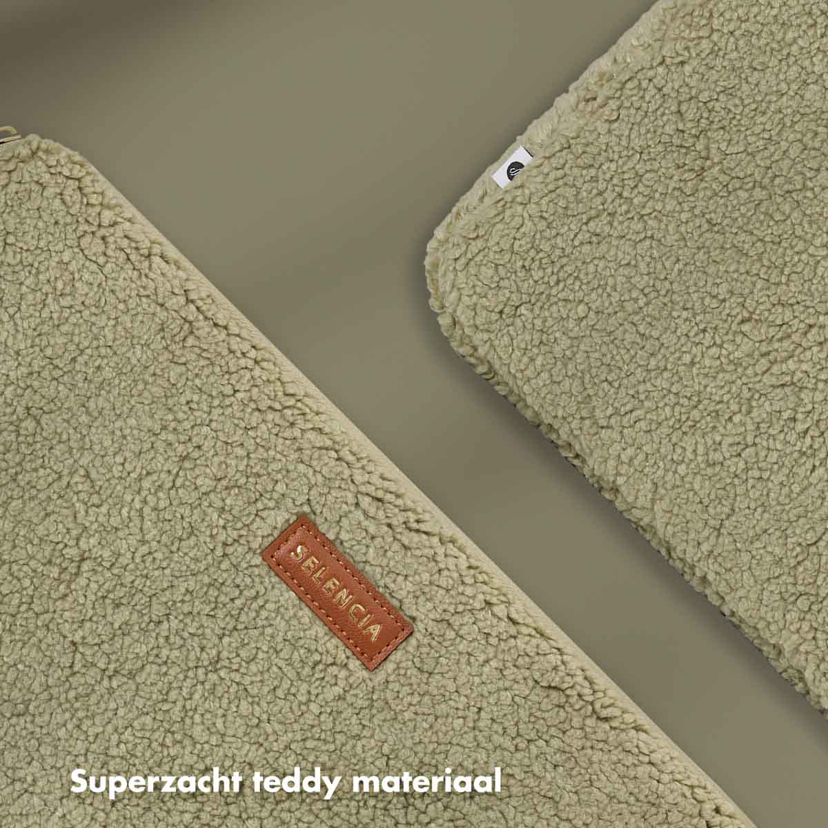 Two light green teddy fabric objects on an olive green background.
