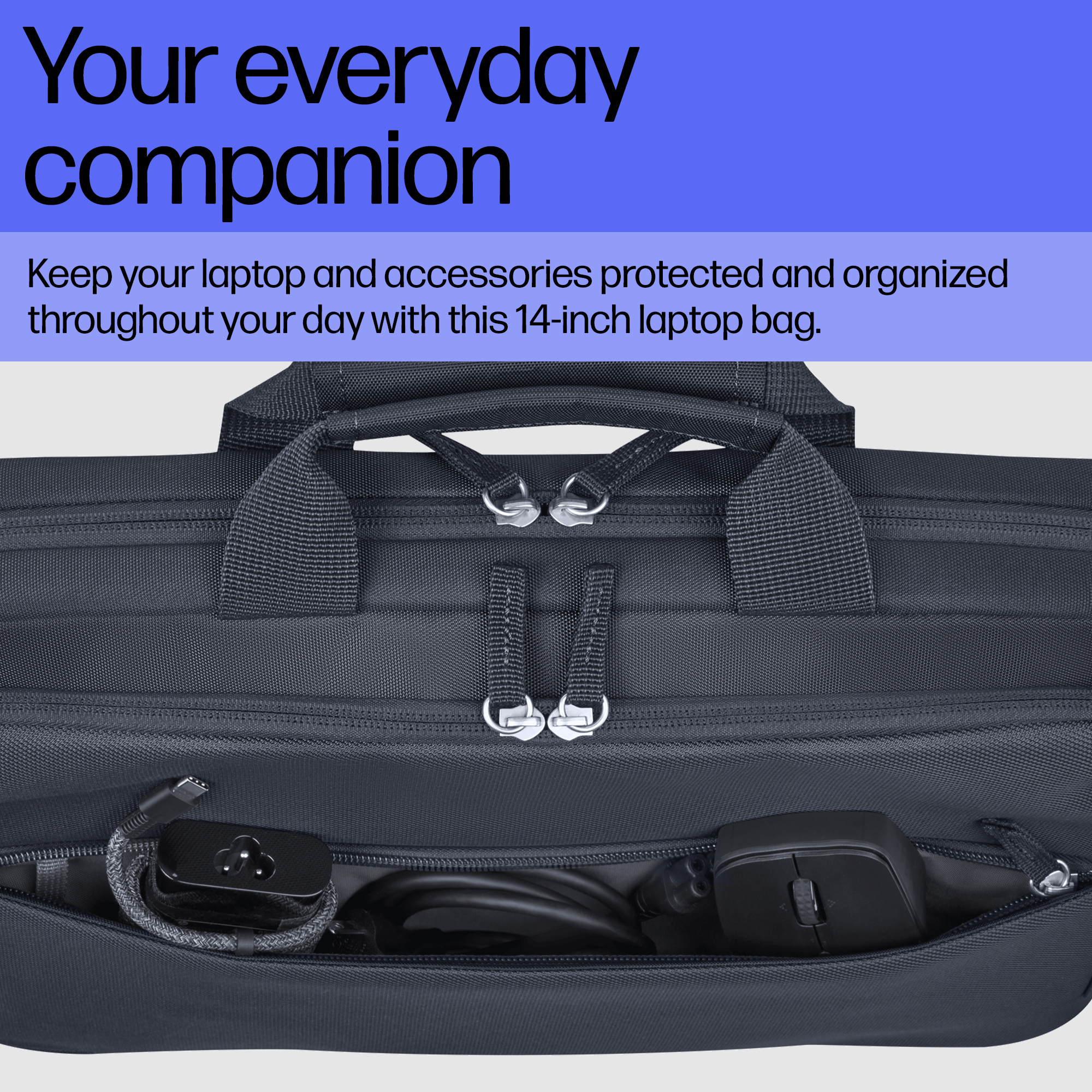 Borsa per laptop grigio scuro con scomparti con cerniera contenenti mouse e cavi.