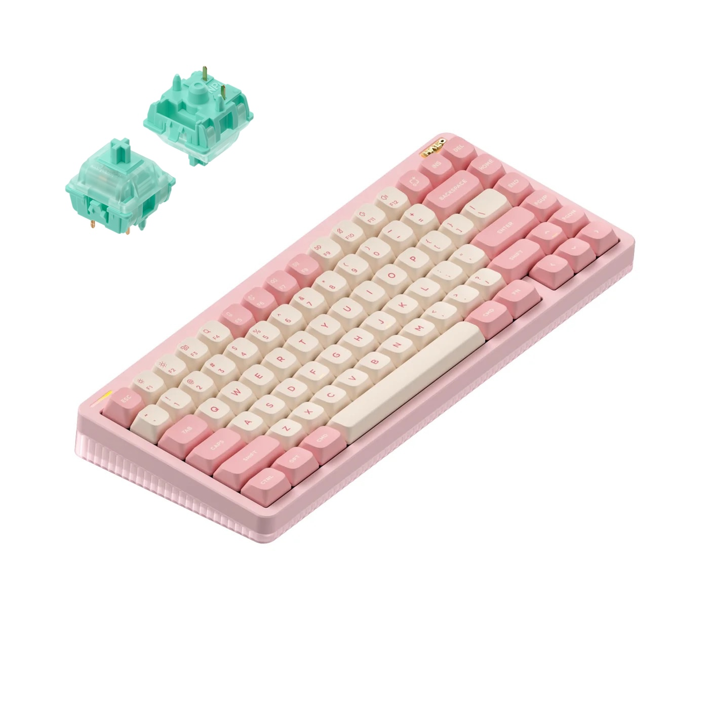 Una tastiera meccanica rosa con tasti color crema e due switch verdi accanto.