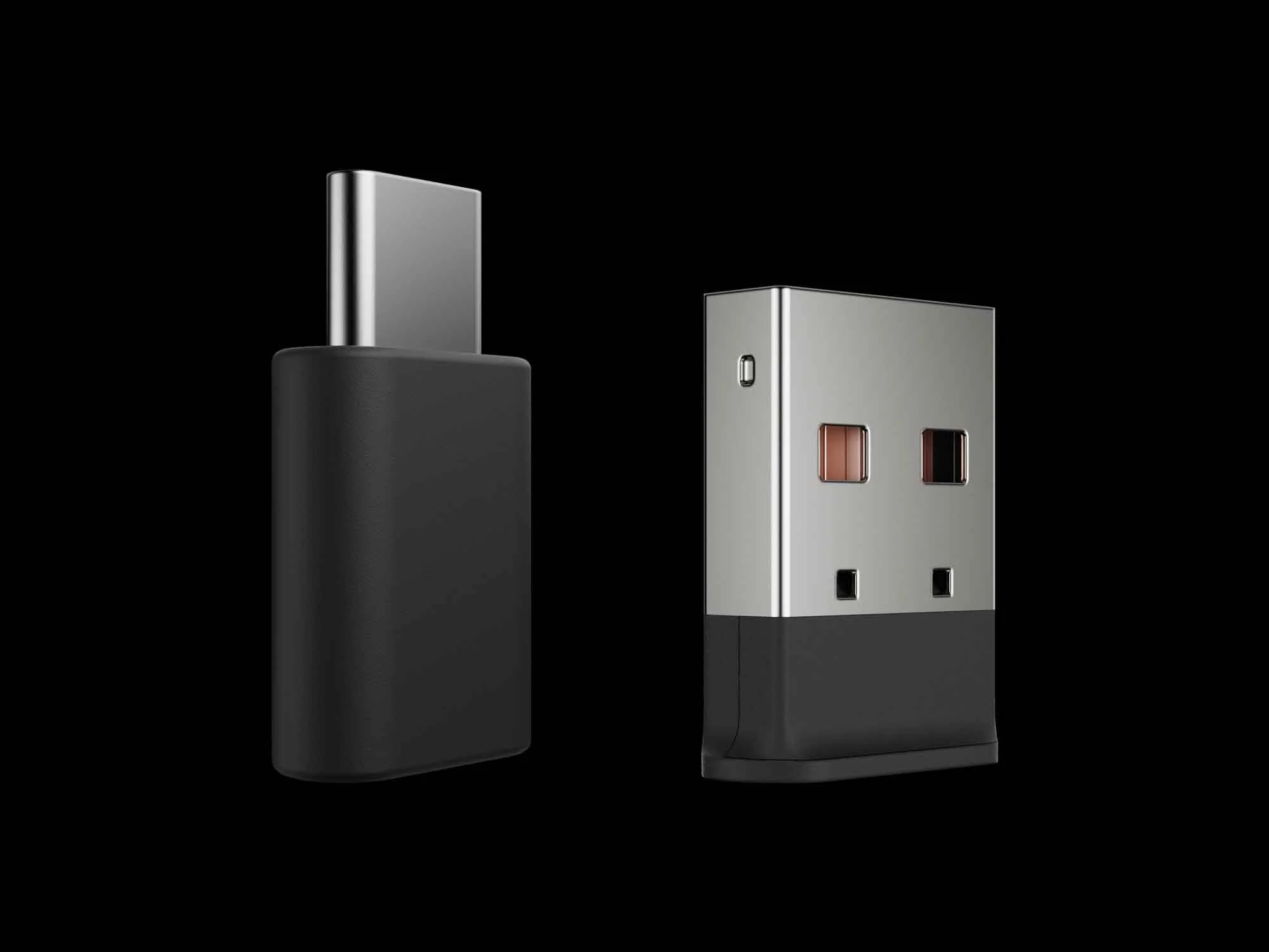 Dwa adaptery USB: czarny USB-C i srebrny USB-A.