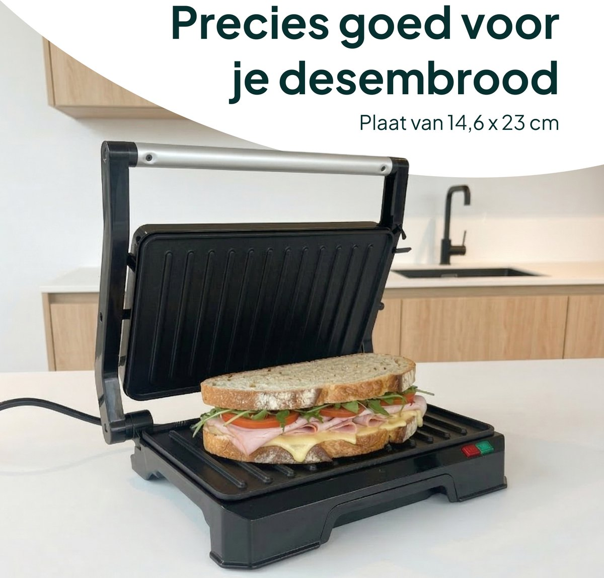 An open sandwich maker with a sandwich inside.