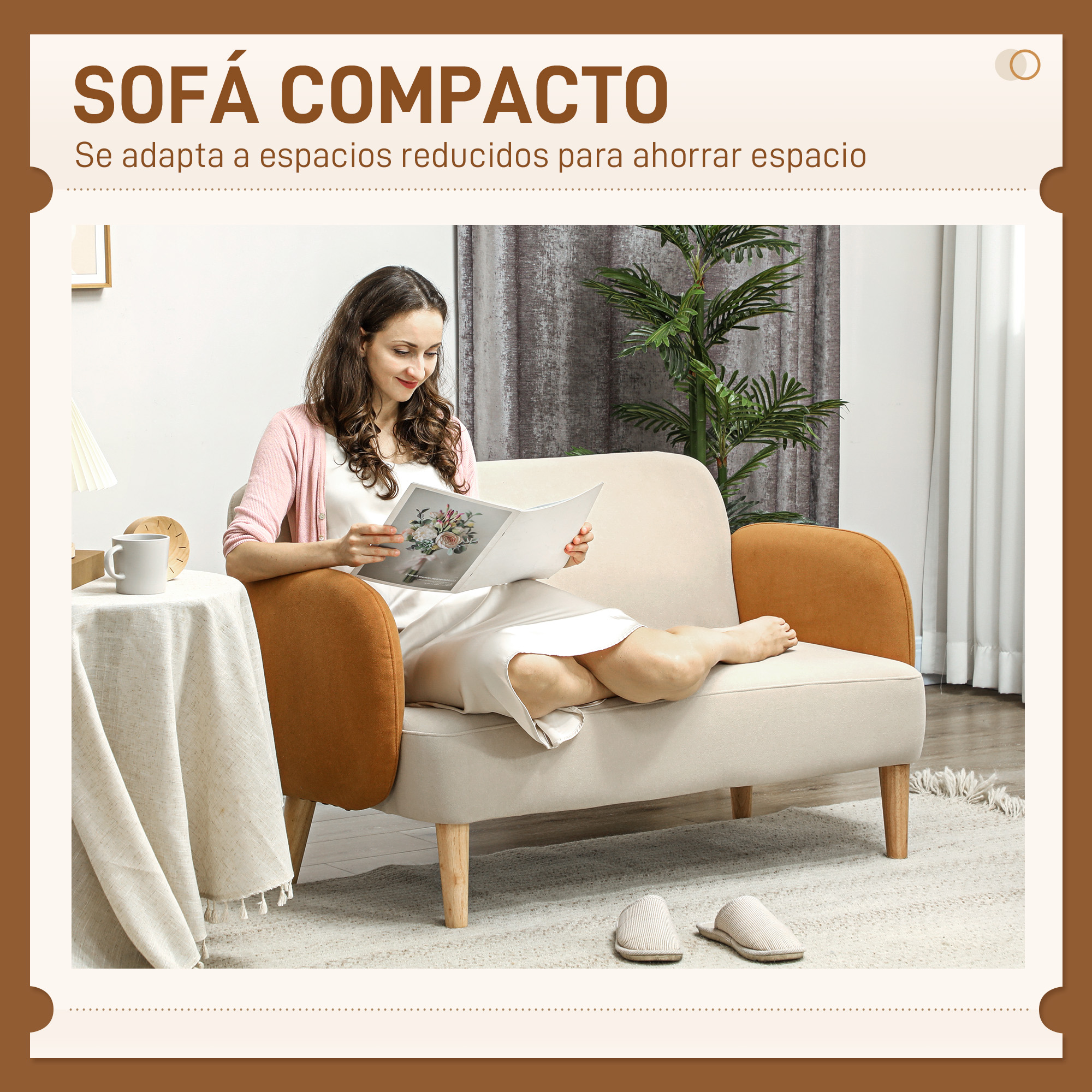 Una mujer lee una revista en un sofá bicolor junto a una mesa con una taza.