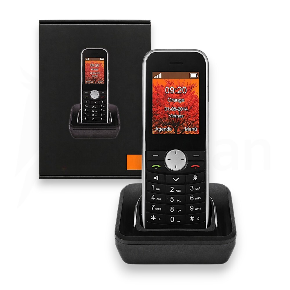 Un teléfono móvil naranja en una base de carga, junto a su caja negra.
