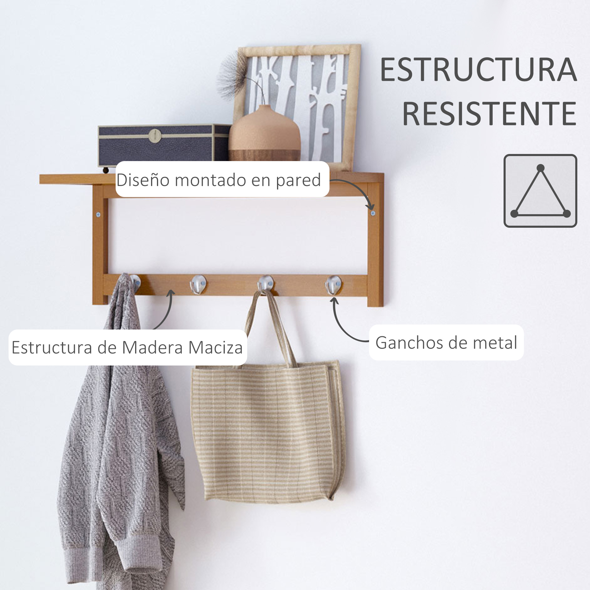 Perchero de madera montado en pared con 3 ganchos metálicos, un jersey gris y un bolso.