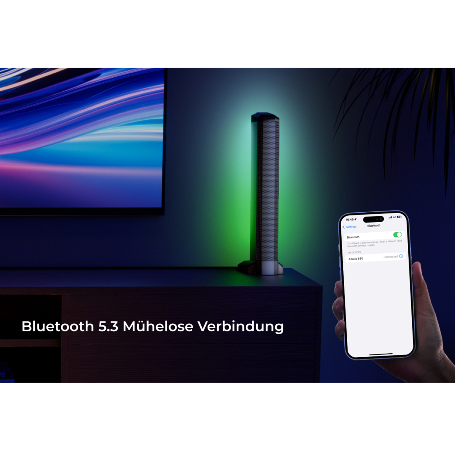 Ein iPhone verbindet sich mit einem Bluetooth-Lautsprecher, der grün leuchtet.