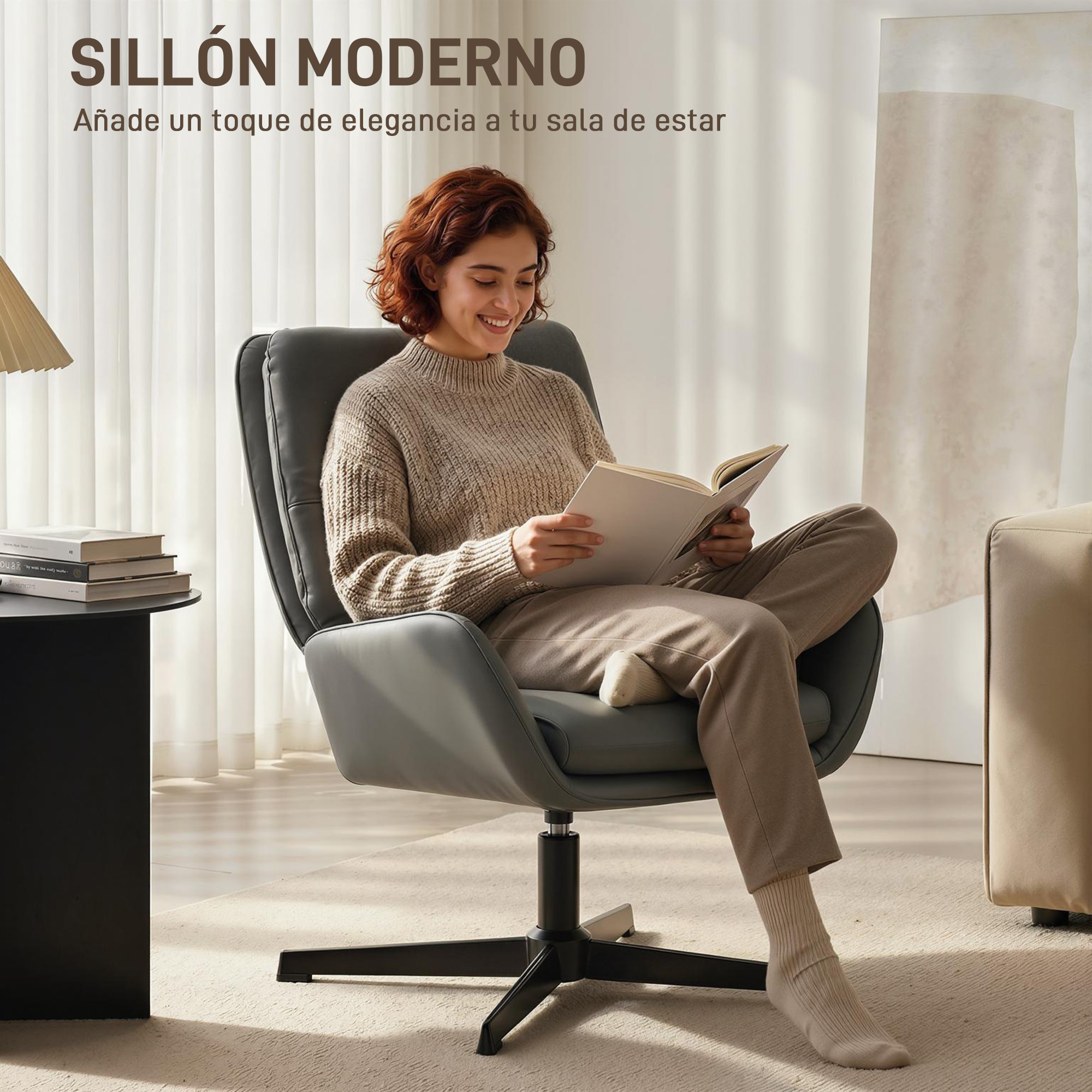 Una mujer lee un libro en un sillón giratorio gris frente a una ventana.