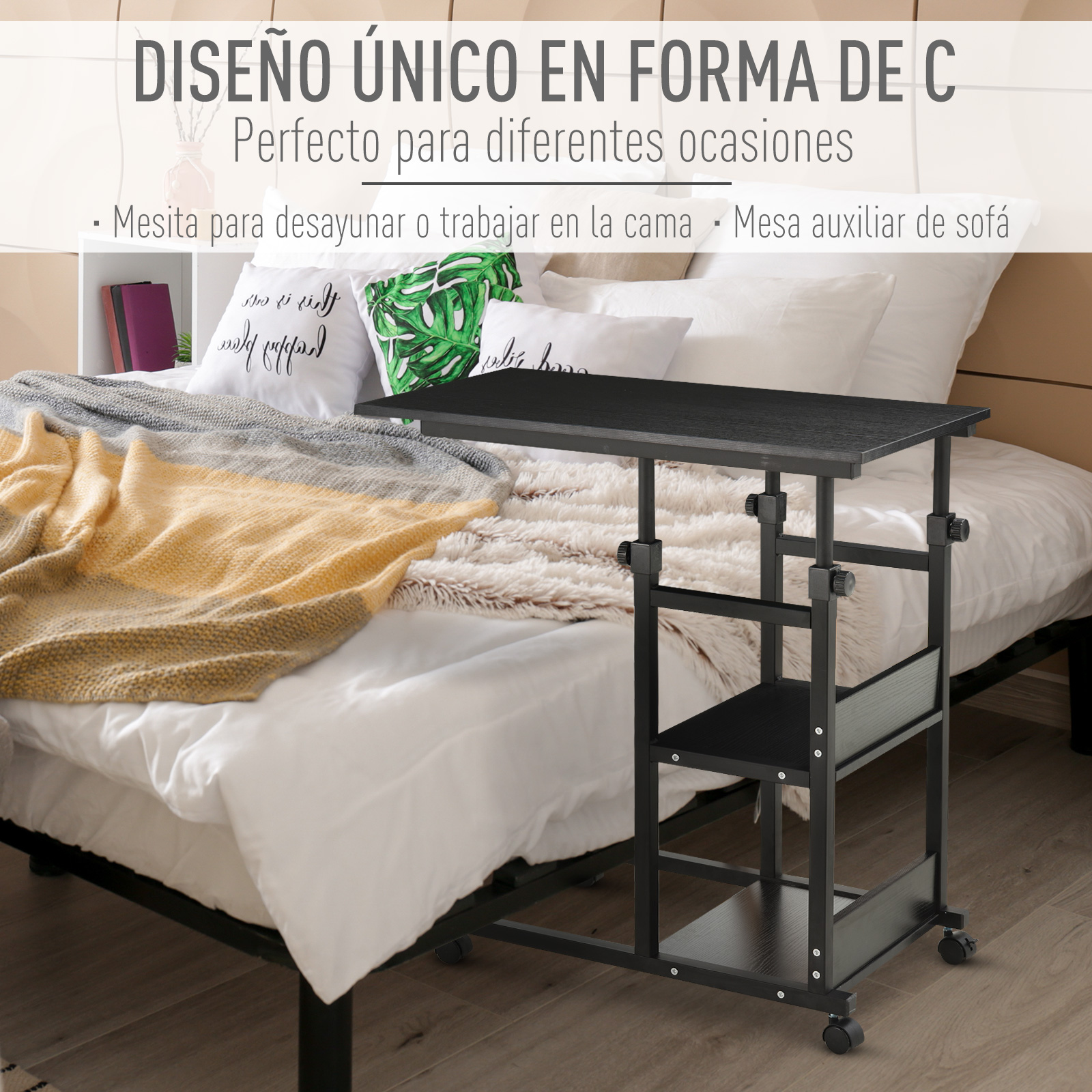 Una mesita auxiliar negra en forma de C con ruedas junto a una cama.