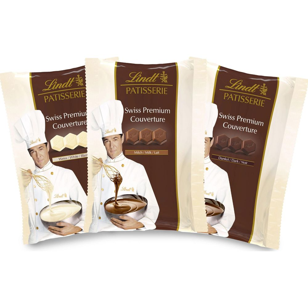Tre confezioni Lindt Patisserie con motivi da chef: cioccolato bianco, latte e fondente.