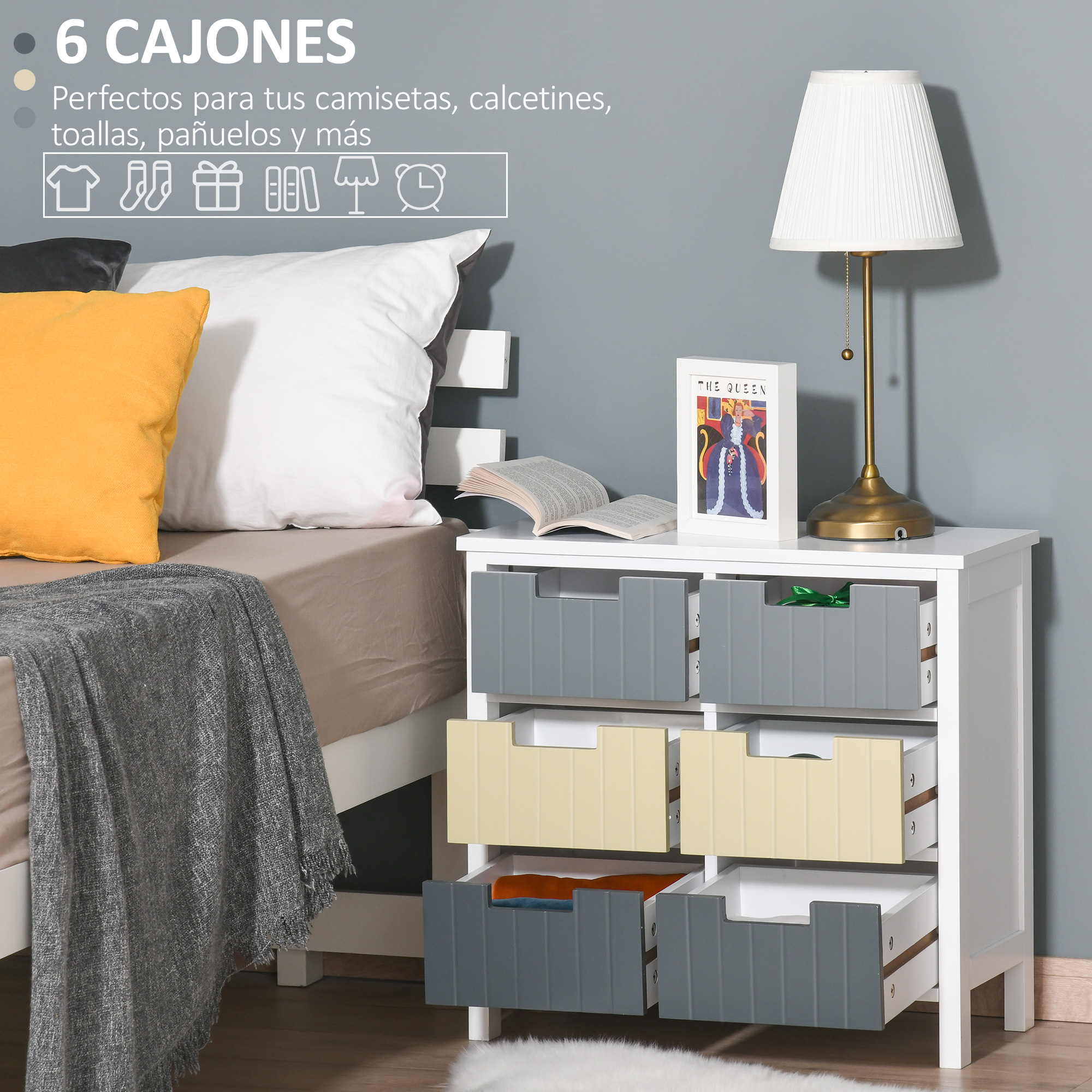 Dormitorio con cómoda, lámpara, cama y cuadro. Cajones en gris y amarillo.