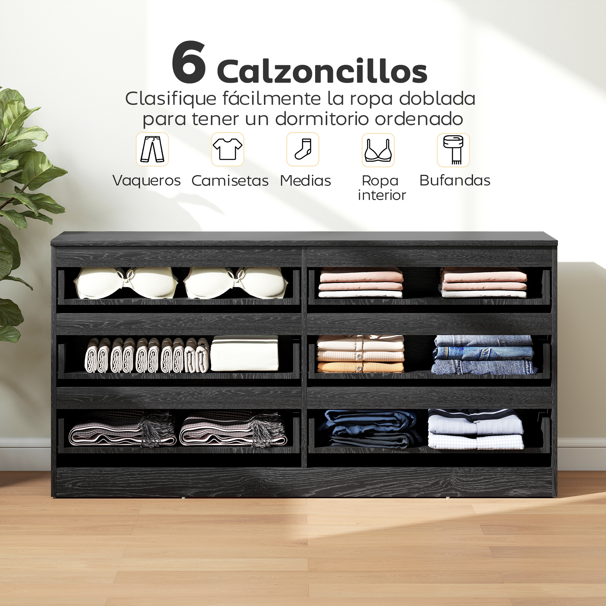 Estantería negra con ropa doblada: sujetadores, toallas, jeans y mantas.