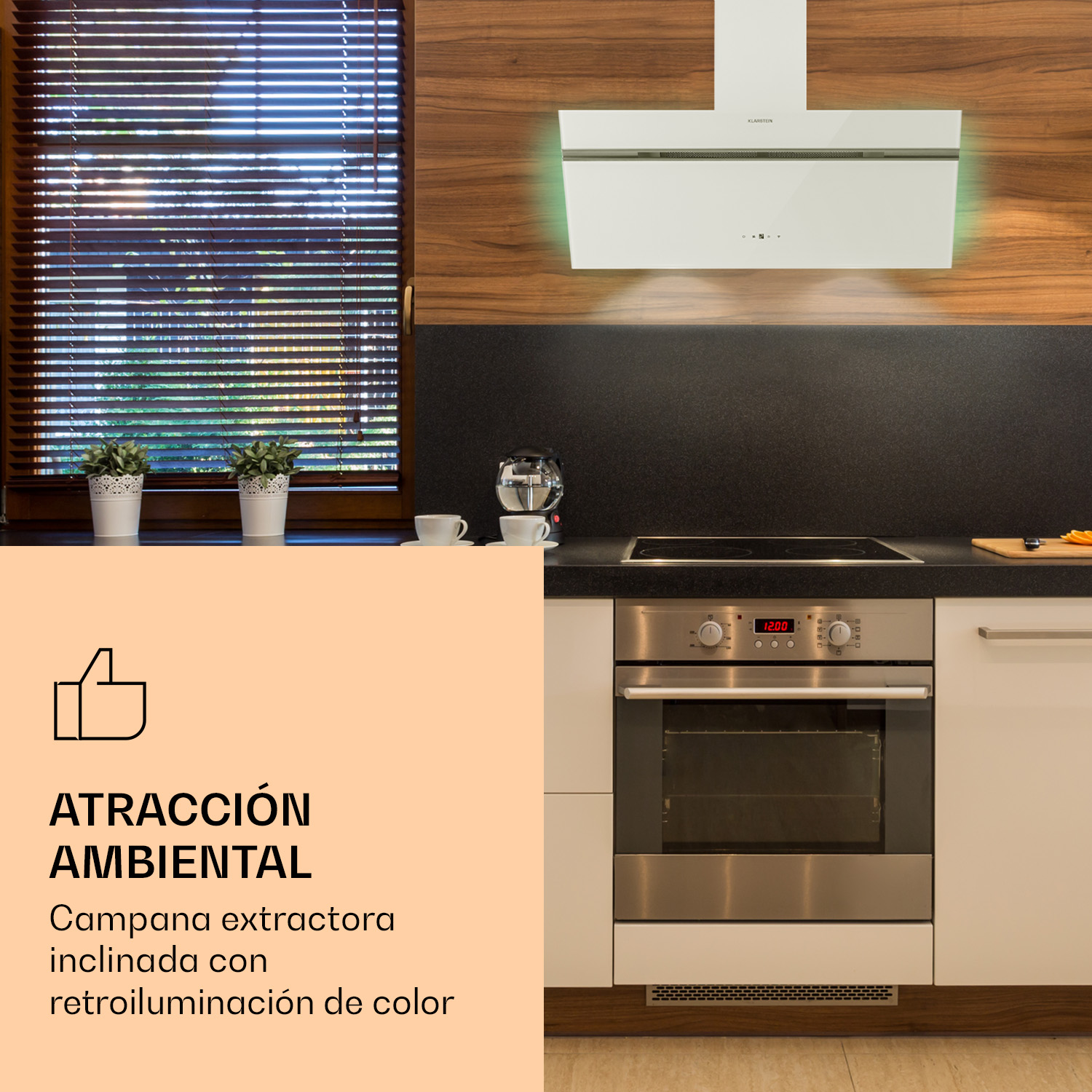 Una campana extractora blanca brilla en verde sobre un horno en una cocina moderna.