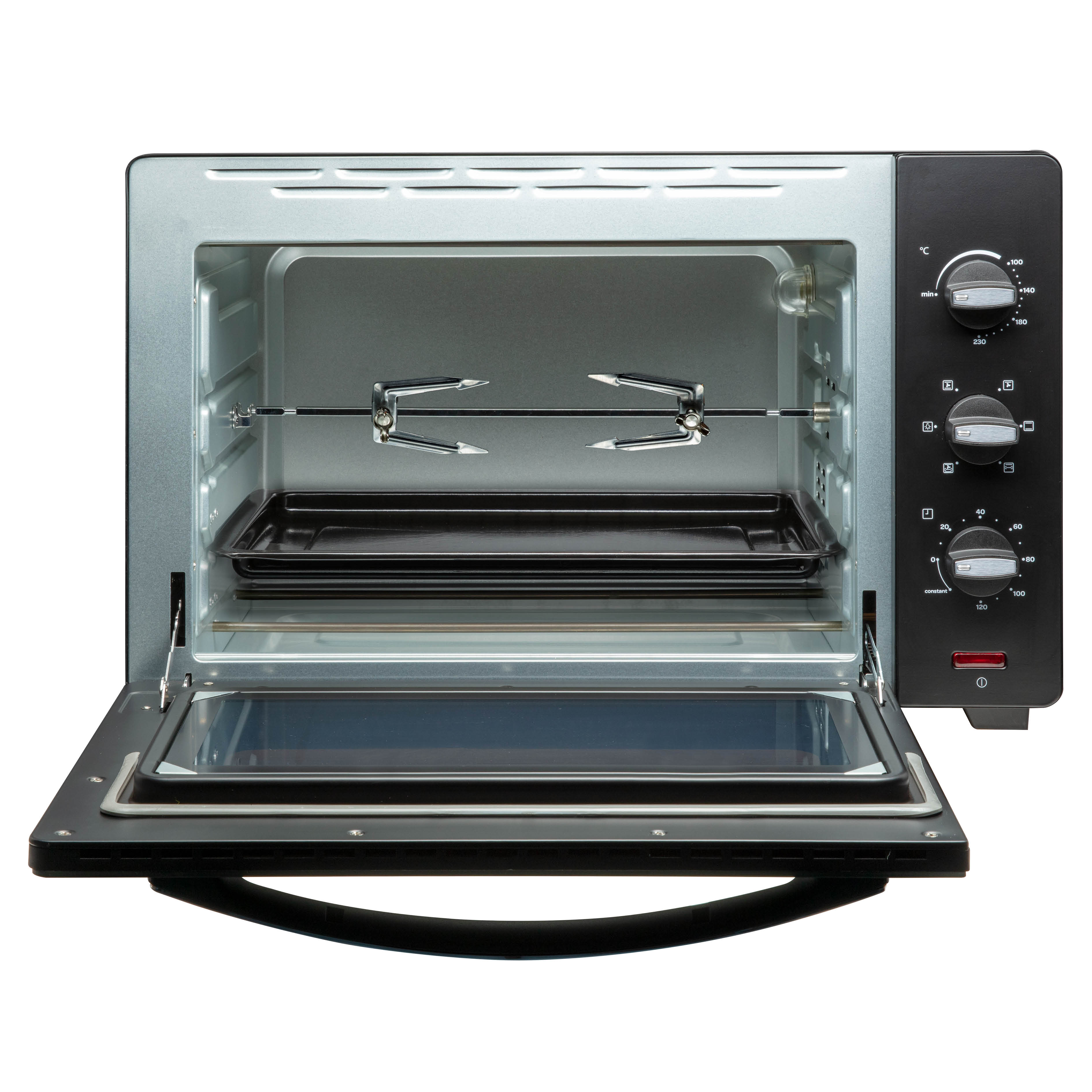An open mini oven with a rotisserie and control knobs.
