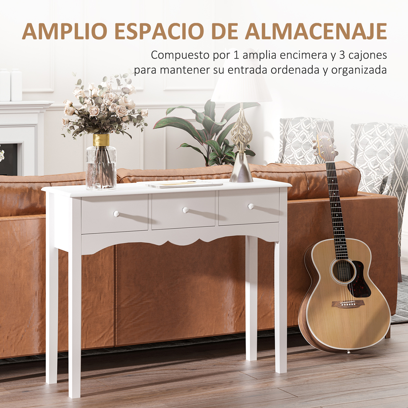 Mesa consola blanca con tres cajones, florero y guitarra.