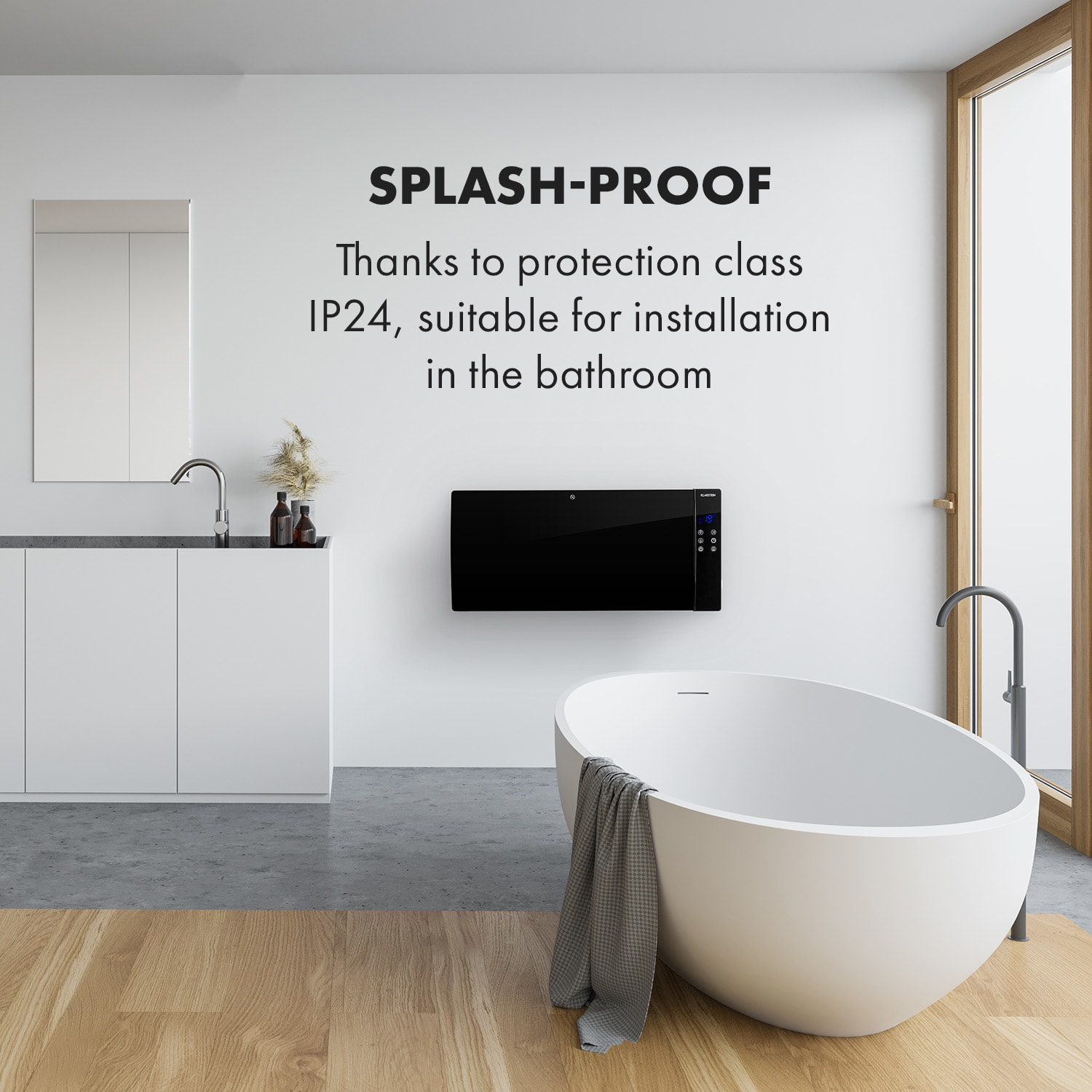 Un bagno moderno con vasca ovale bianca, stufa nera e mobiletto. Testo: RESISTENTE AGLI SCHIZZI IP24.
