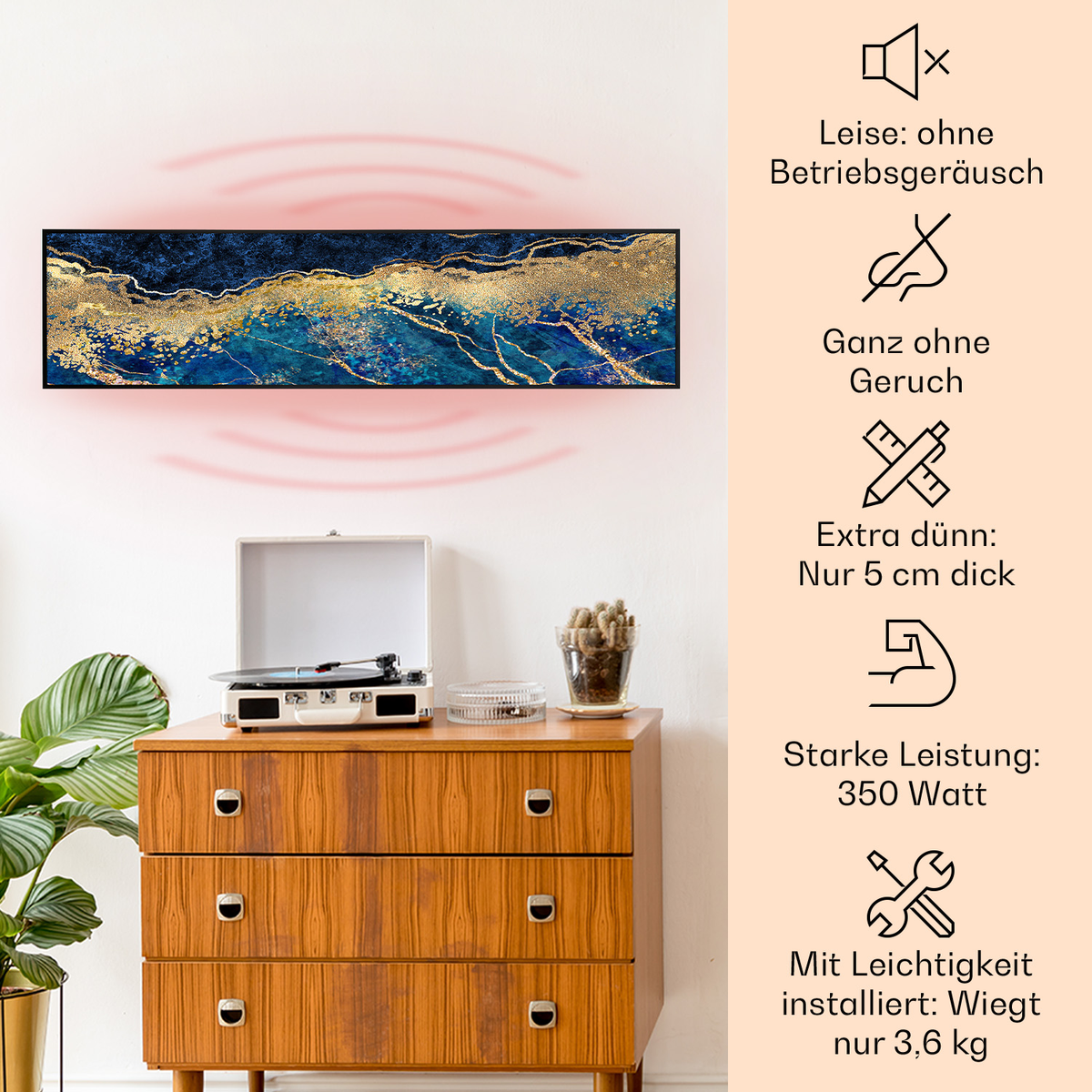 Arte moderna su muro, cassettiera vintage con giradischi e pianta.