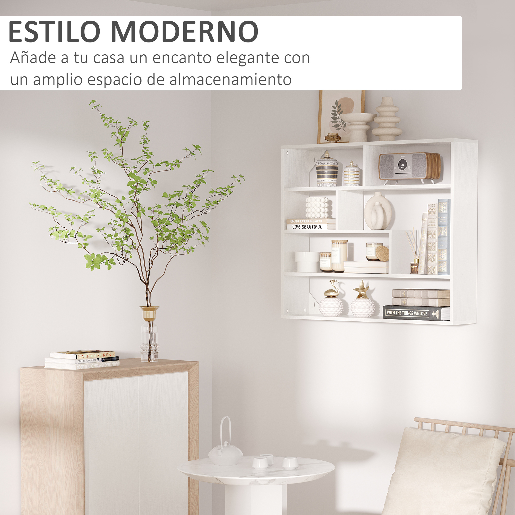 Un estante blanco con decoración, libros y una planta junto a un aparador.