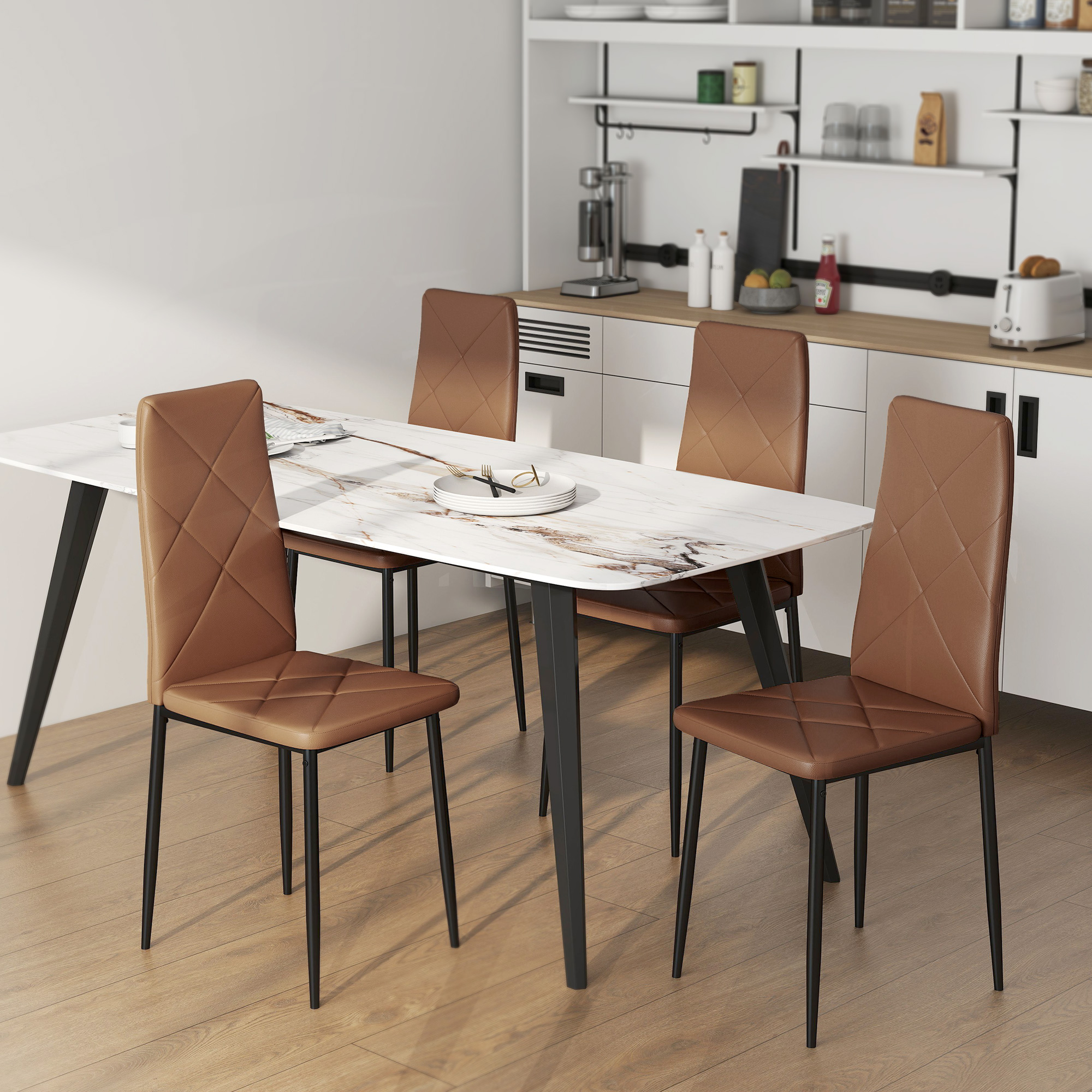 Moderna mesa de comedor con mesa de mármol blanco y sillas marrones en cocina luminosa.