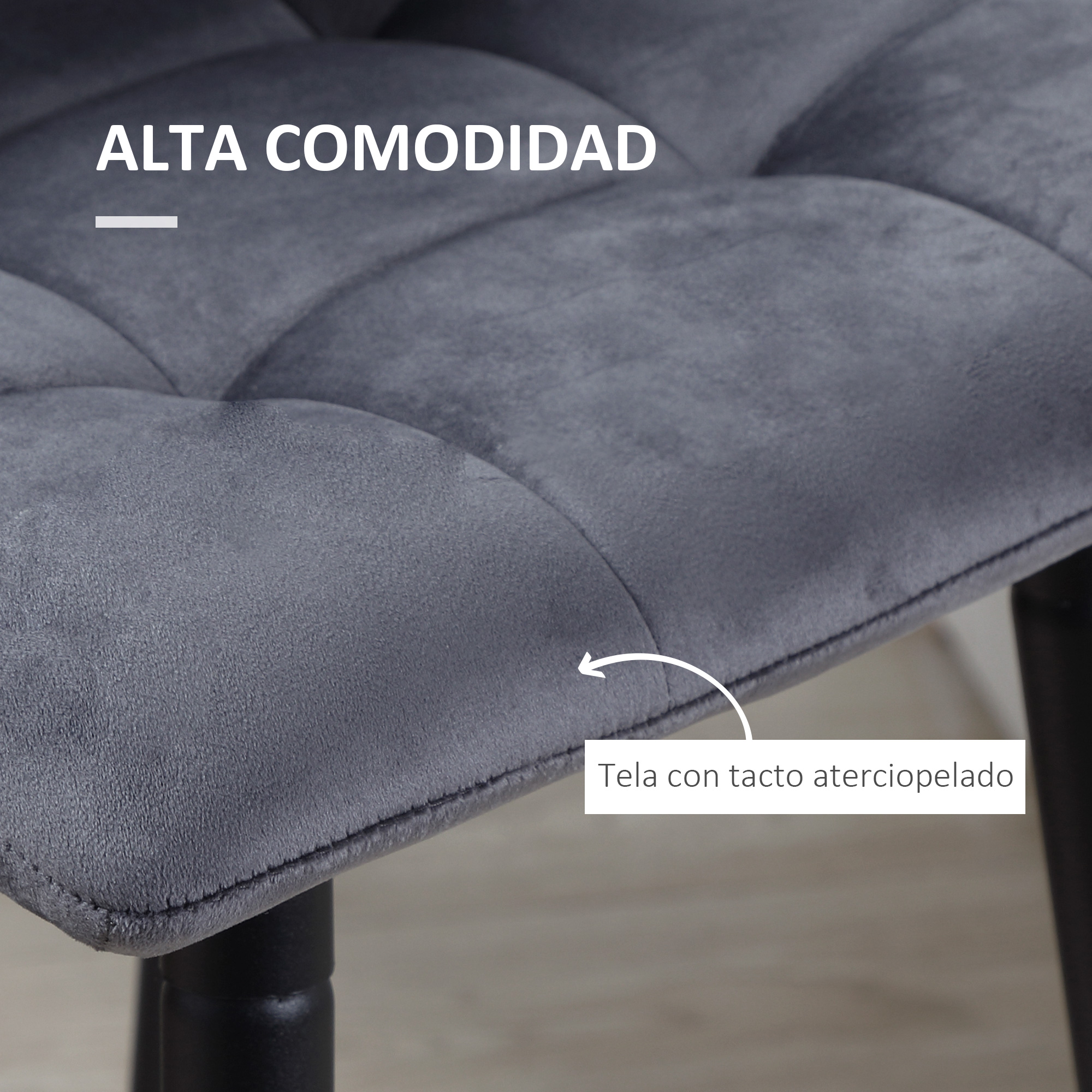 Silla de tela gris con superficie acolchada y tacto aterciopelado.