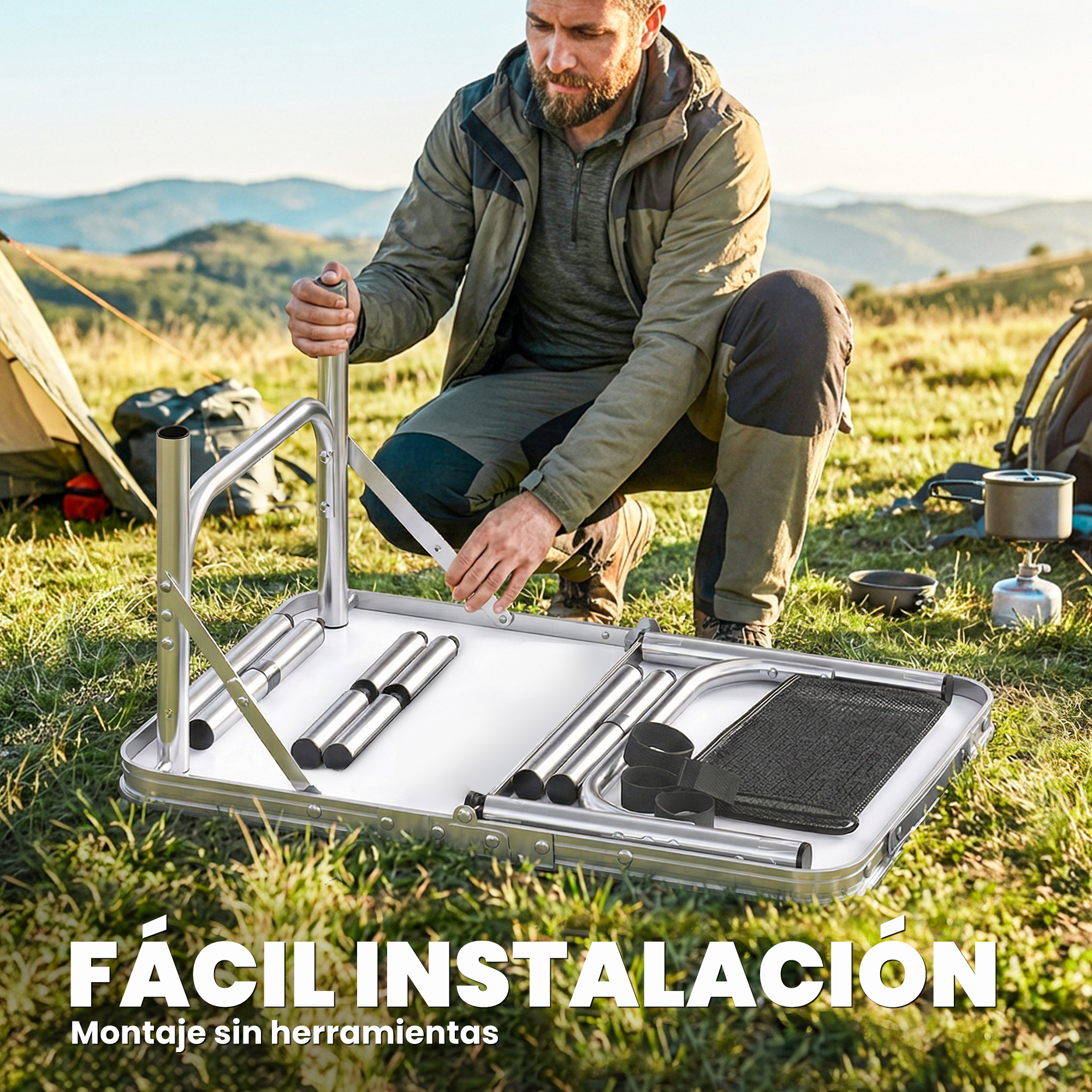 Hombre montando mesa de camping al aire libre. Montañas y tienda de campaña.