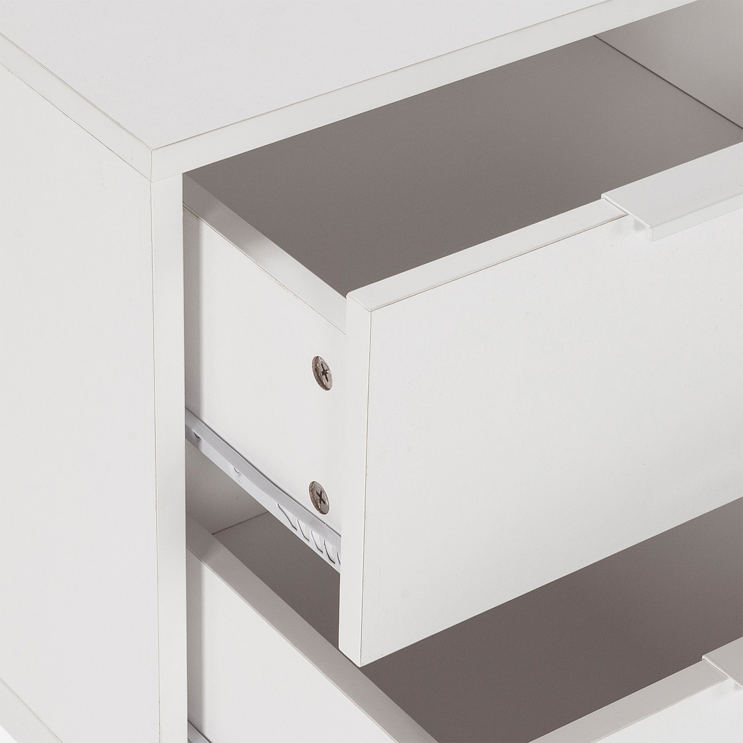 Un mueble de cajones blanco abierto con rieles metálicos y tornillos.