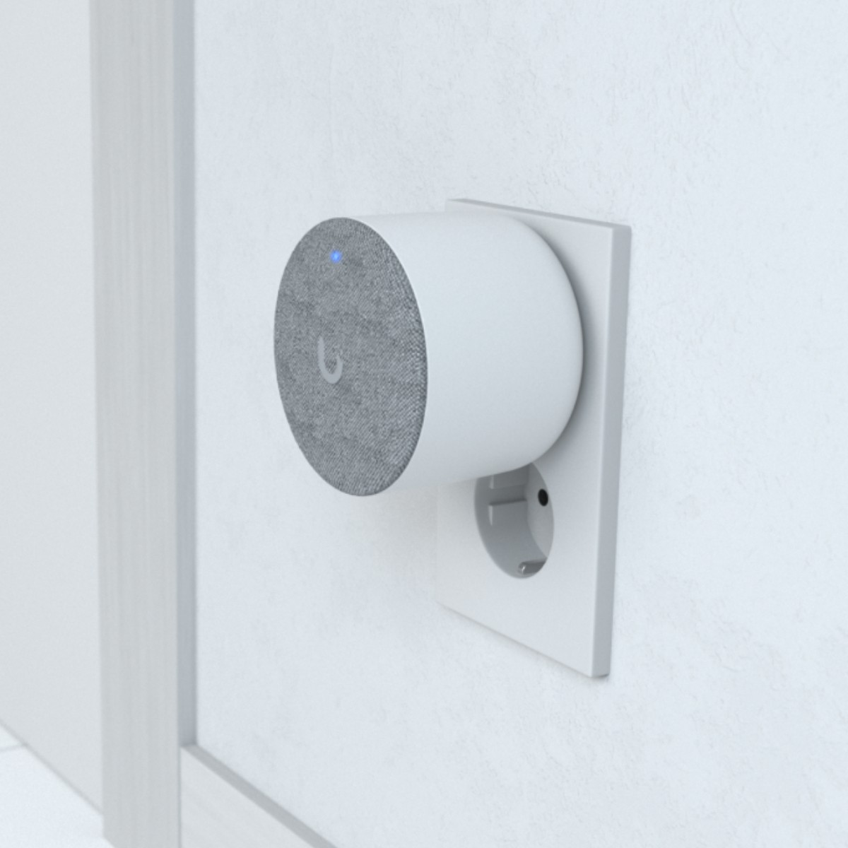 Gray smart speaker with blue light plugged into a white wall outlet.