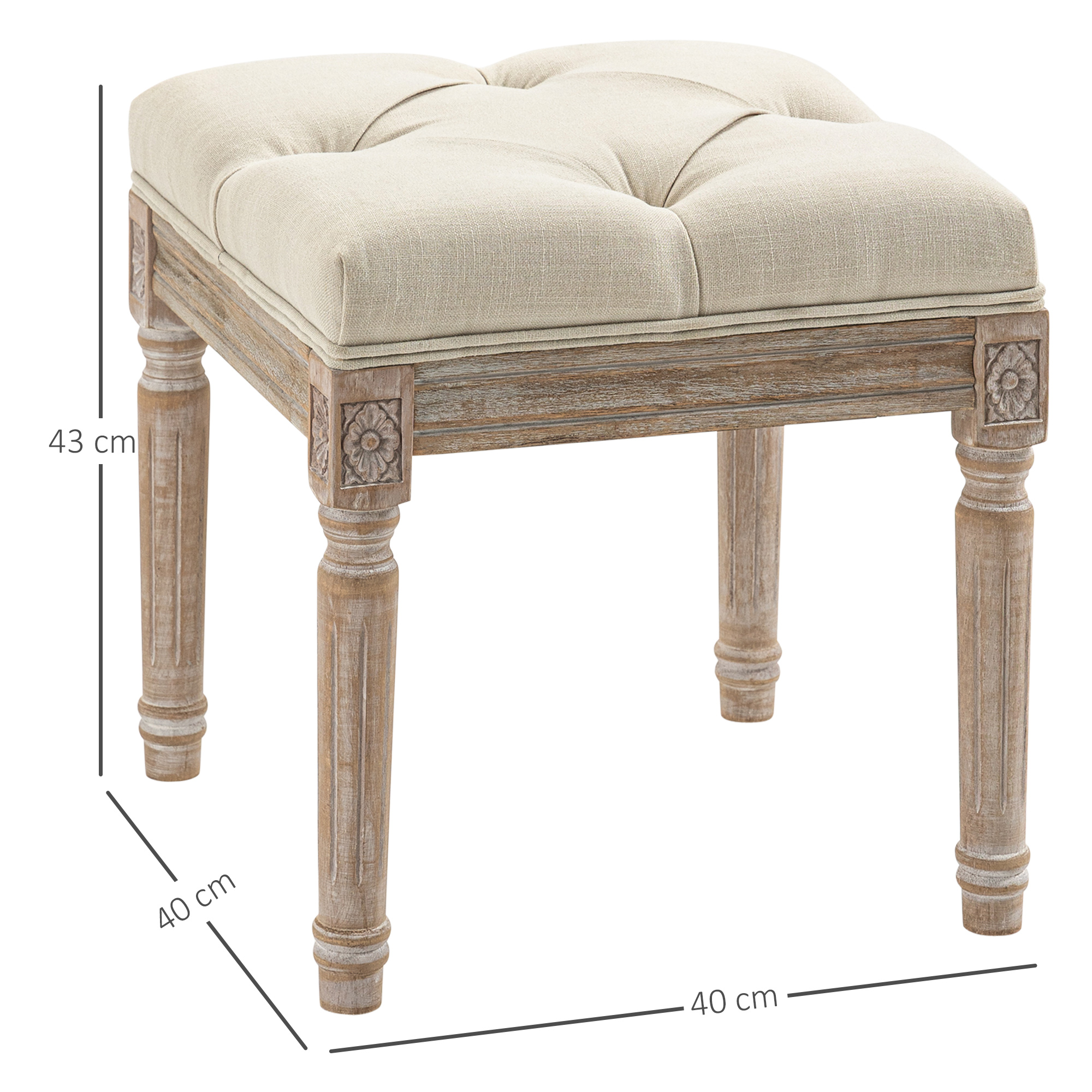 Un otomana beige acolchada con patas de madera tallada, 43cm alto, 40cm ancho.