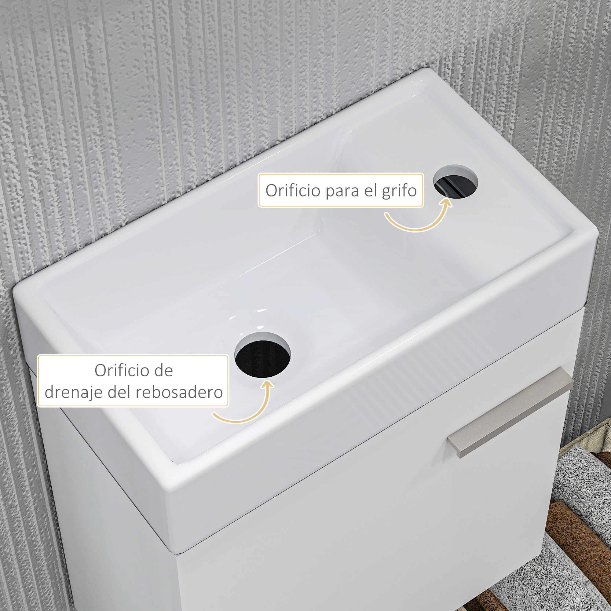 Un lavabo blanco con un orificio para grifo y un orificio de rebosadero en una pared.
