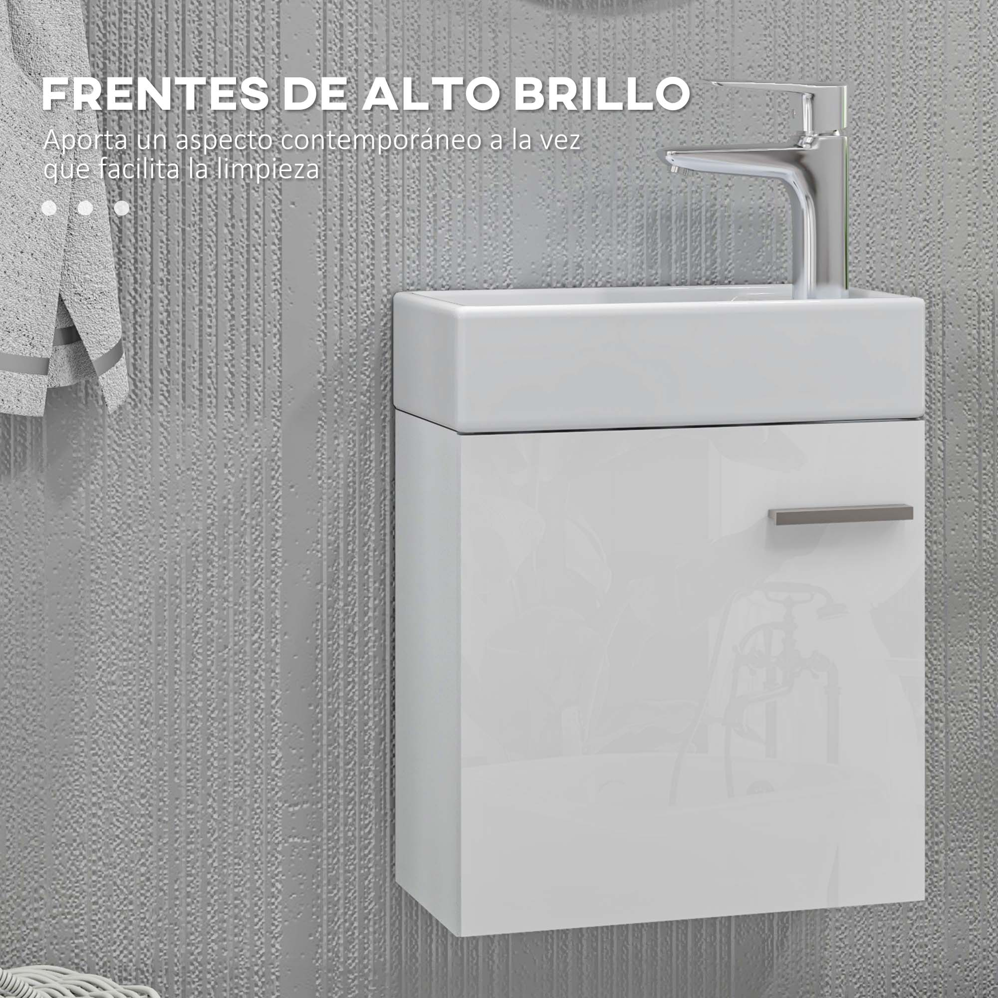 Un mueble de baño brillante con grifo y toalla colgada. Pared texturizada.