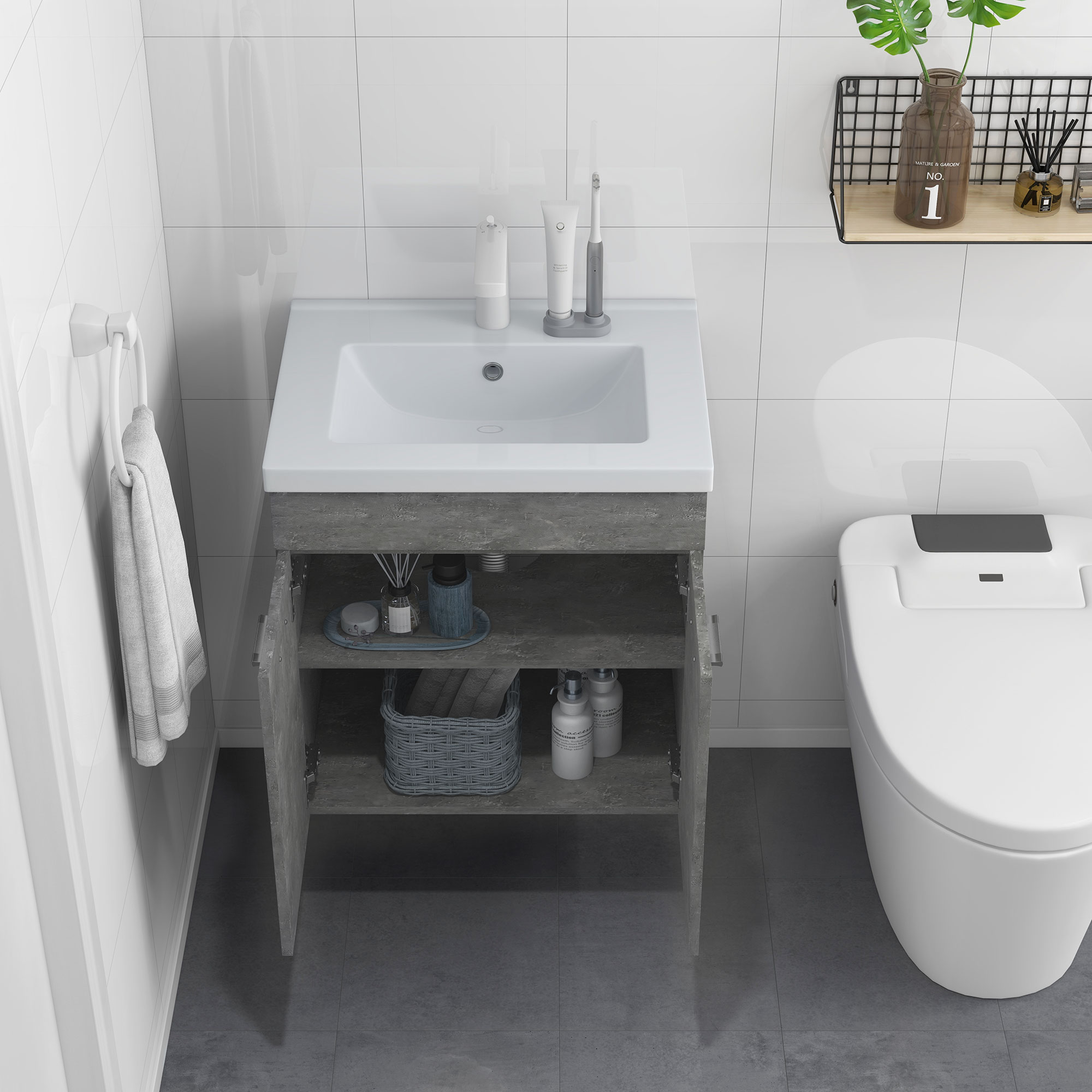 Baño moderno con mueble de lavabo, inodoro y toallero. Incluye artículos de tocador.