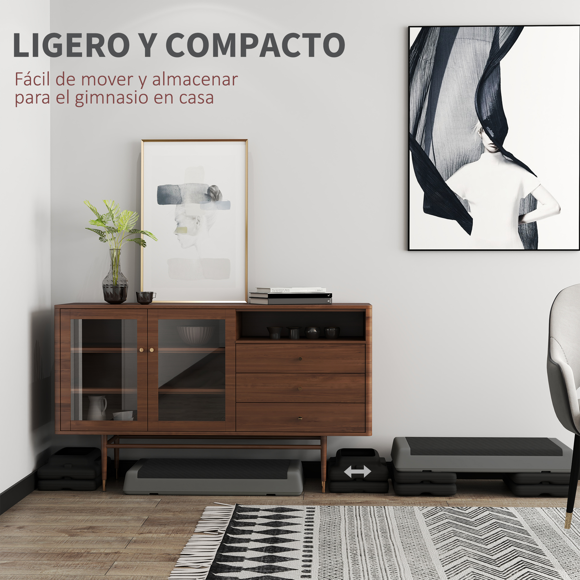 Un armario de madera con arte, plataformas de step y alfombra.