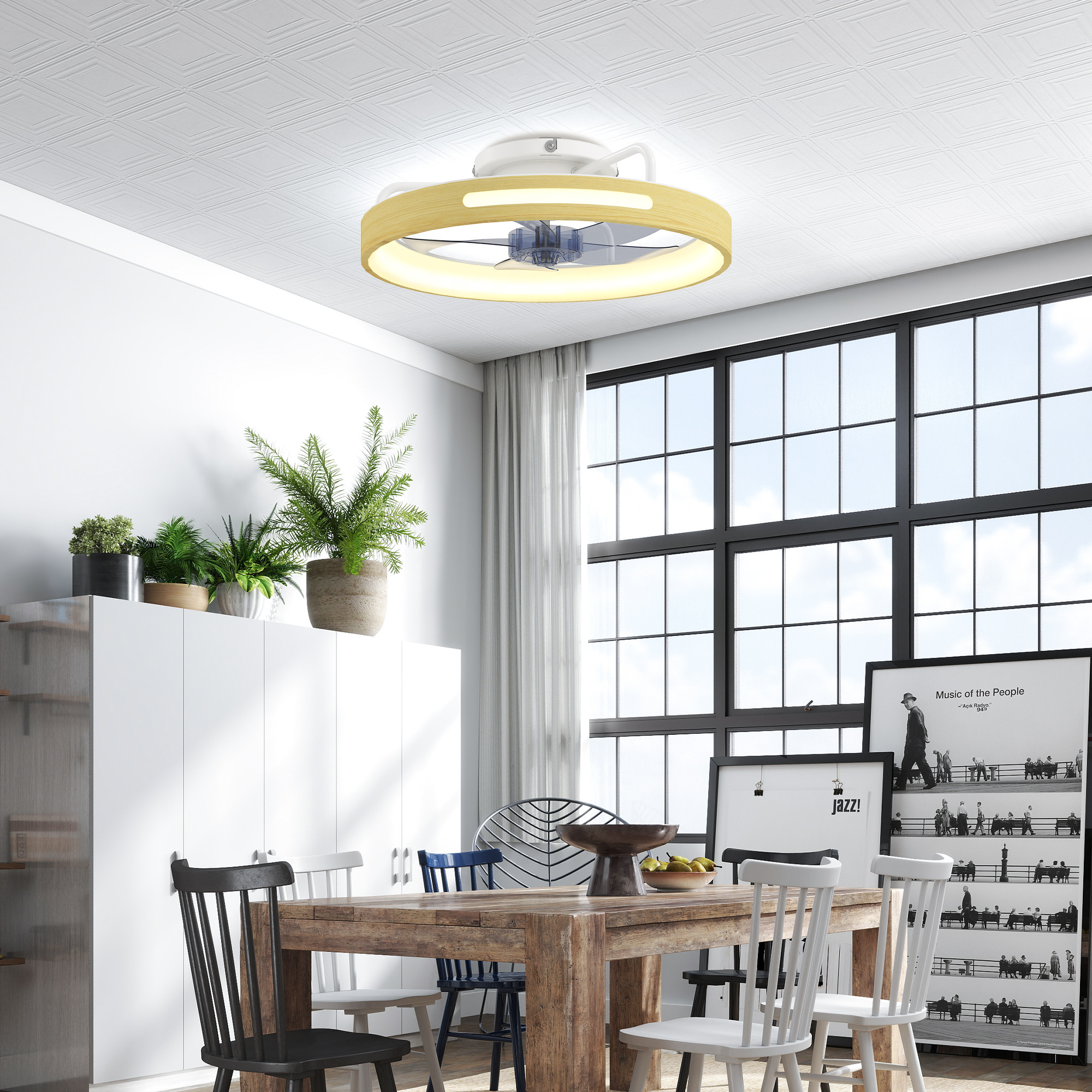 Una mesa de comedor de madera con sillas y plantas frente a una ventana grande.