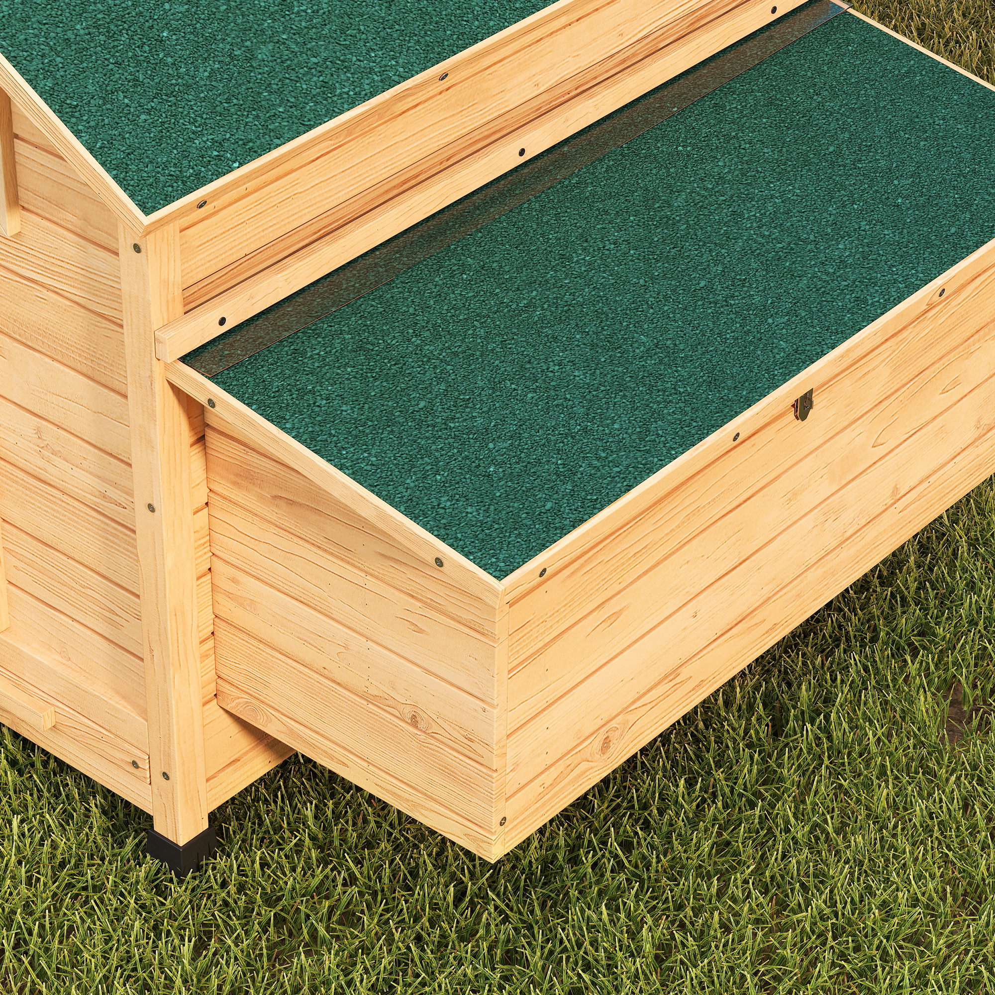 Una casa de madera con tejados verdes sobre césped.