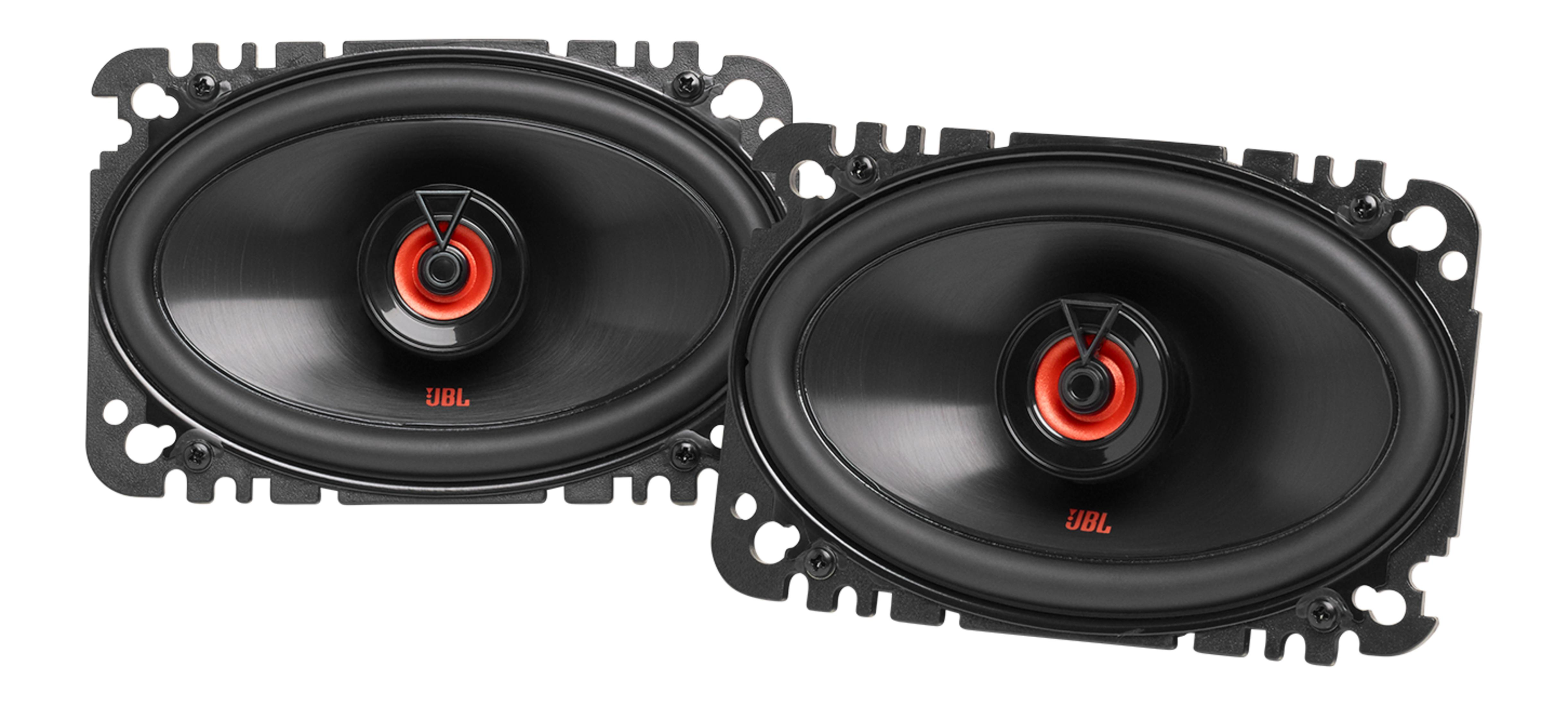 Twee ovale JBL autoluidsprekers met zwarte conussen en rode accenten.