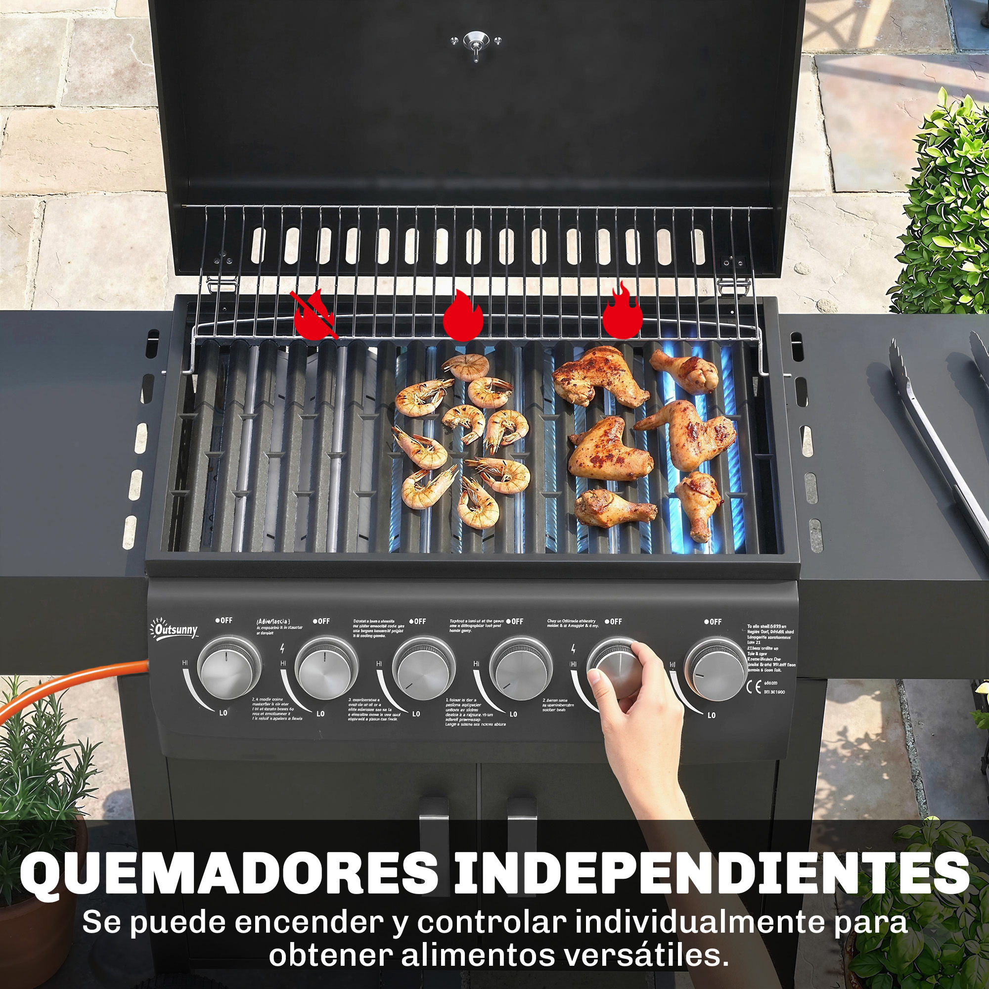 Una parrilla con carne y camarones, llamas en los quemadores.